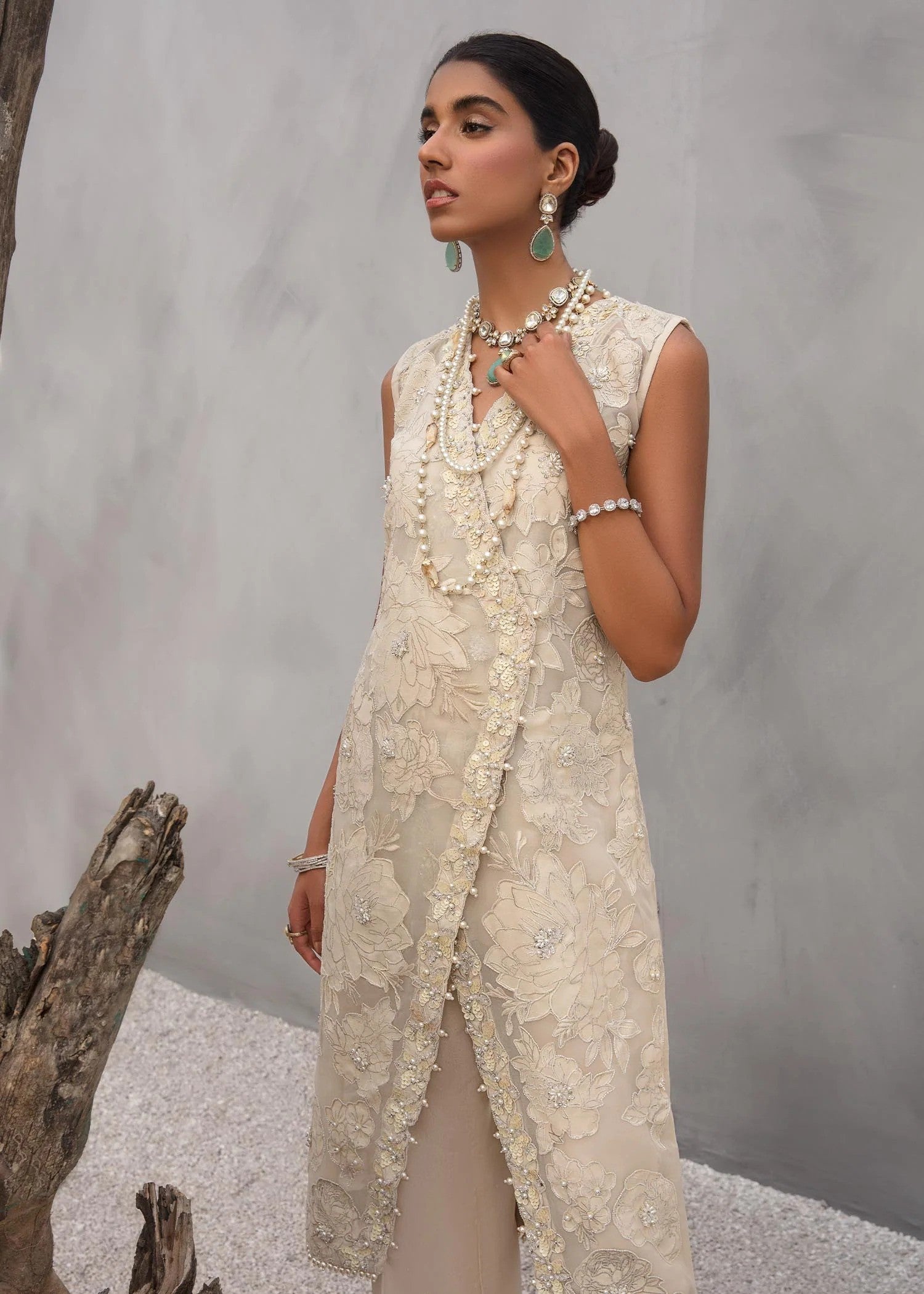 Angrakha crossover shirt in Korean raw silk with crystal florals and silk pants.