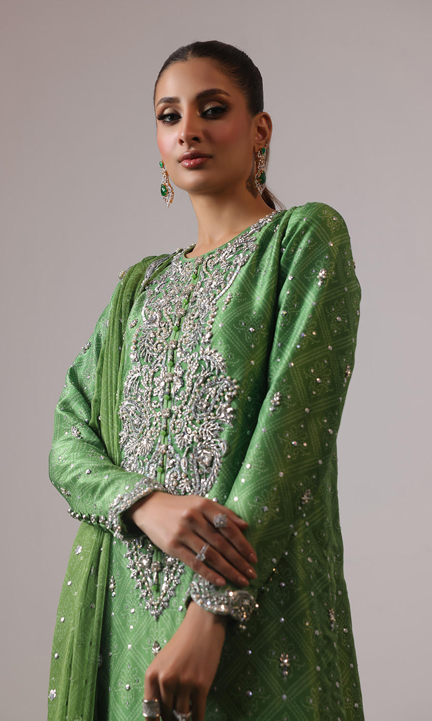Green raw silk Pakistani dress with chunri print, zardozi work & scalloped chiffon dupatta – NAOW-566 by Pakistanimoda
