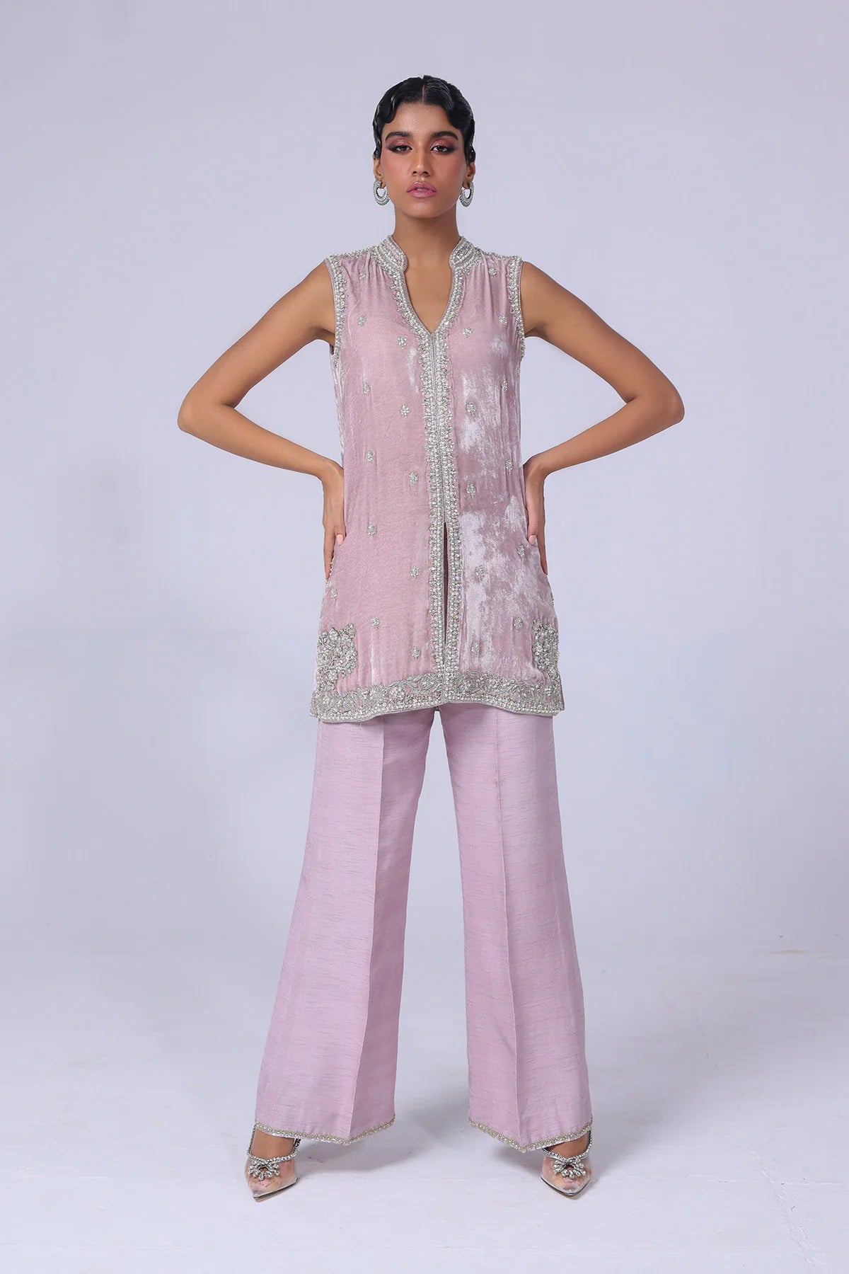 Light lilac velvet jacket with silver & gold handwork, paired with raw silk pants and a matching organza dupatta – perfect for formal events 2025.