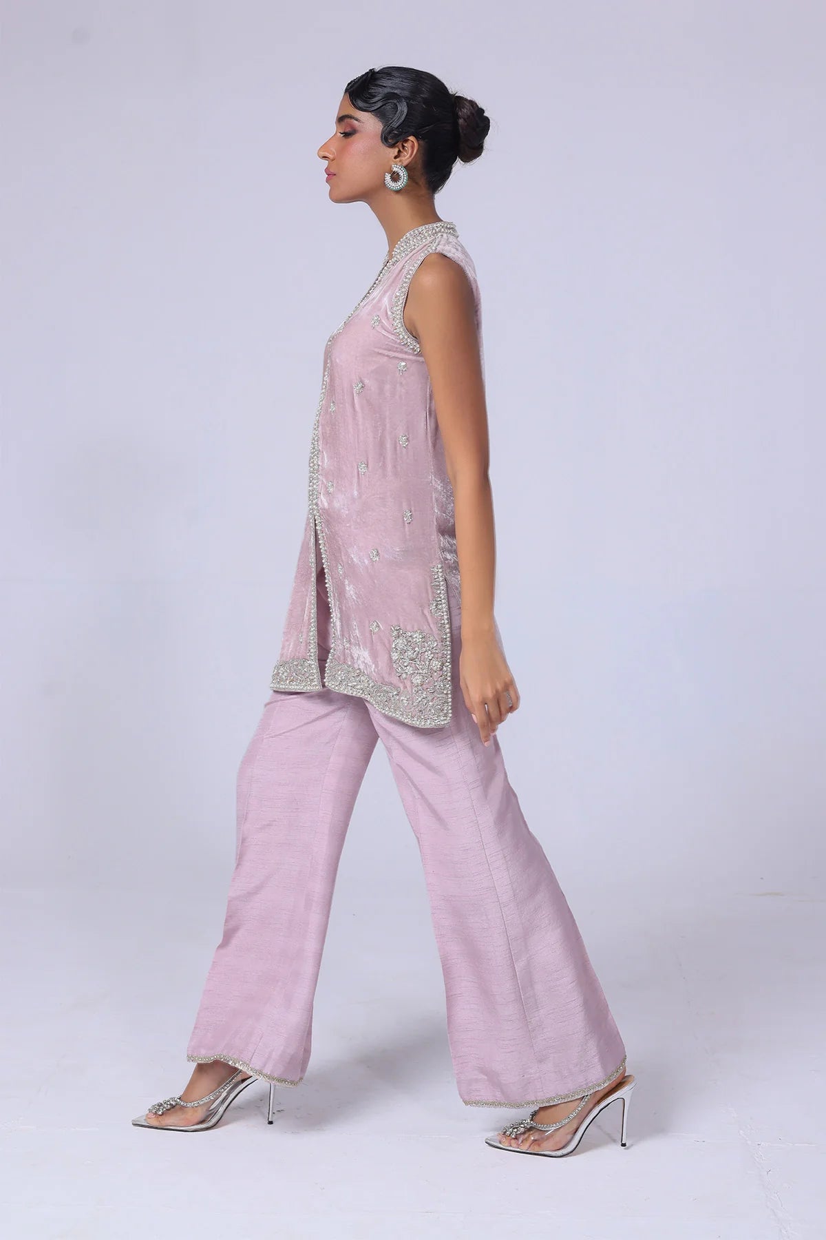 Light lilac velvet jacket with silver & gold handwork, paired with raw silk pants and a matching organza dupatta – perfect for formal events 2025.