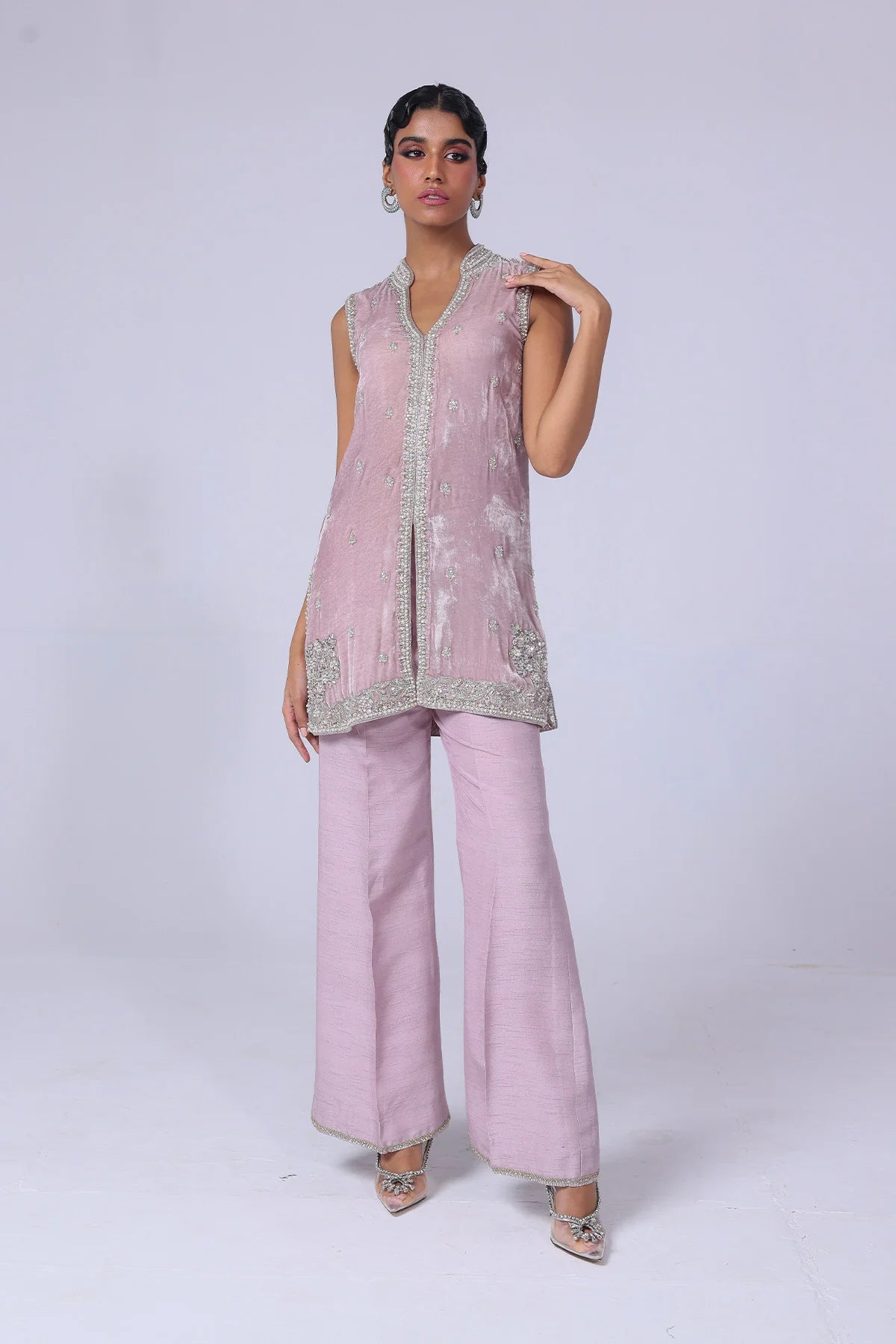 Light lilac velvet jacket with silver & gold handwork, paired with raw silk pants and a matching organza dupatta – perfect for formal events 2025.