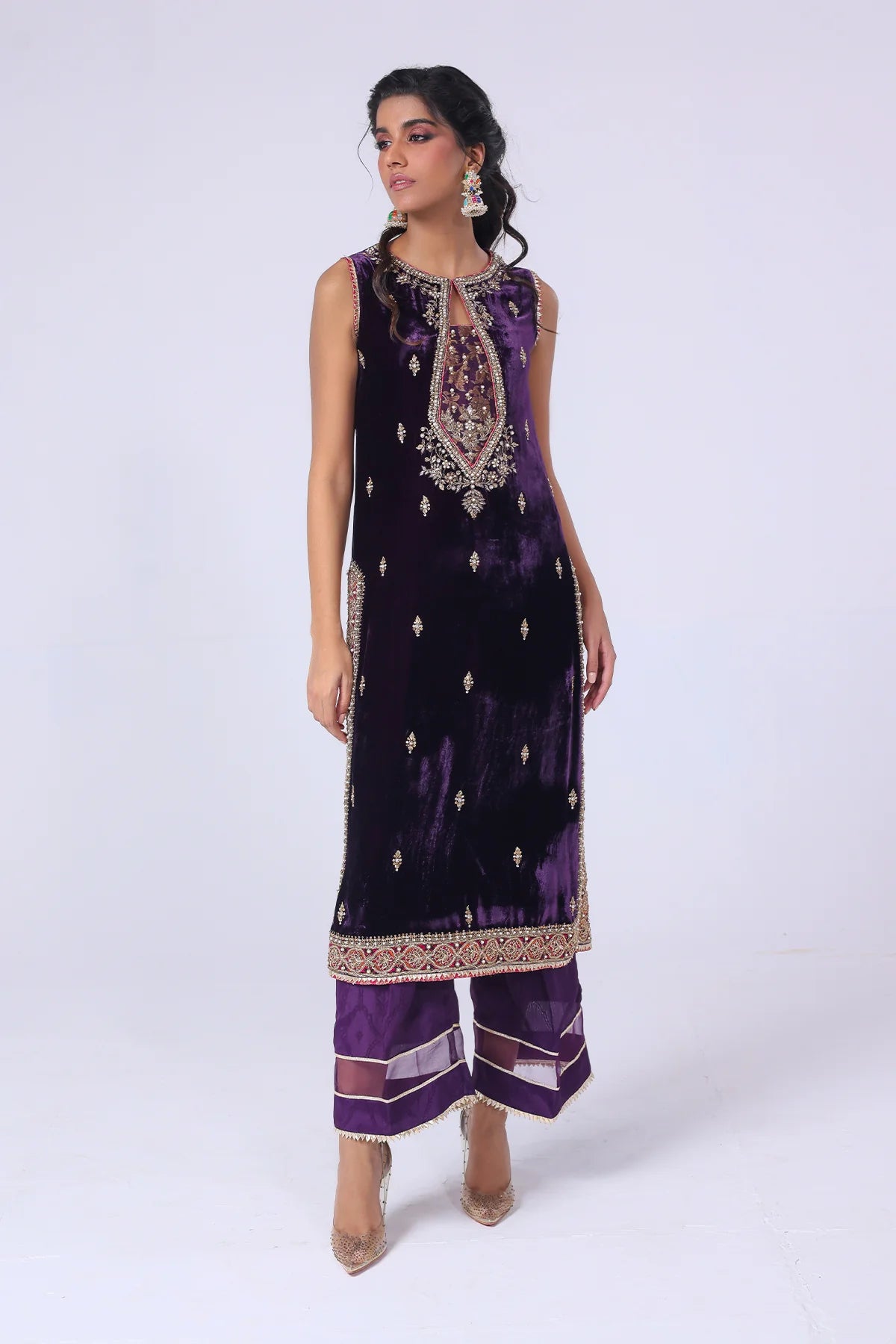 Deep purple velvet shirt with cotton net zari neckline, hand embellishments, silk pants with organza hem, and matching dupatta – formal wear 2025.