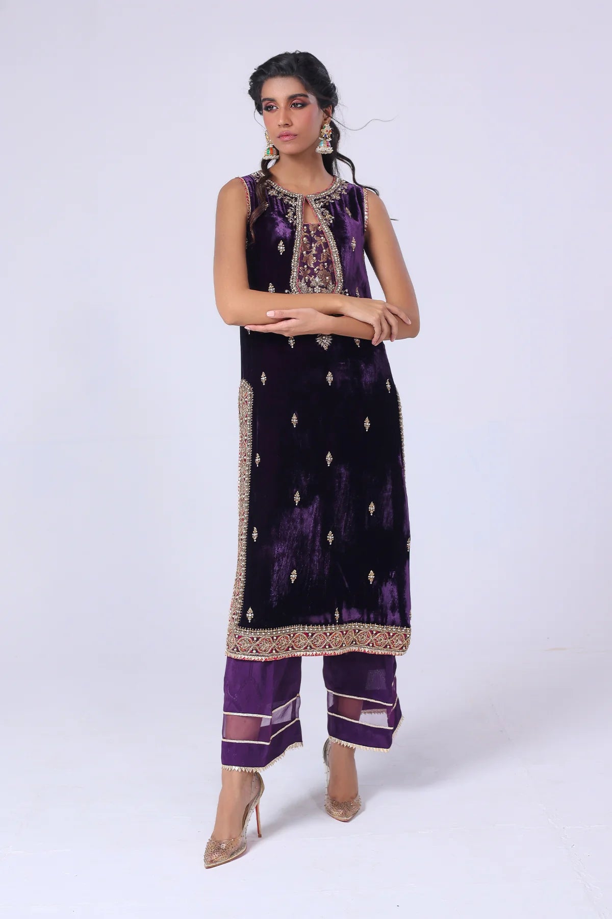 Deep purple velvet shirt with cotton net zari neckline, hand embellishments, silk pants with organza hem, and matching dupatta – formal wear 2025.