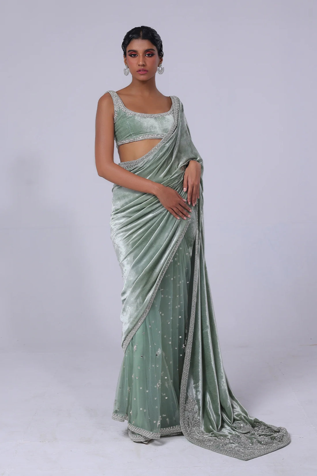 Light green Pakistani saree with velvet pallu, net mukesh fall, and silver embellished blouse – ideal for receptions and formal events in 2025.