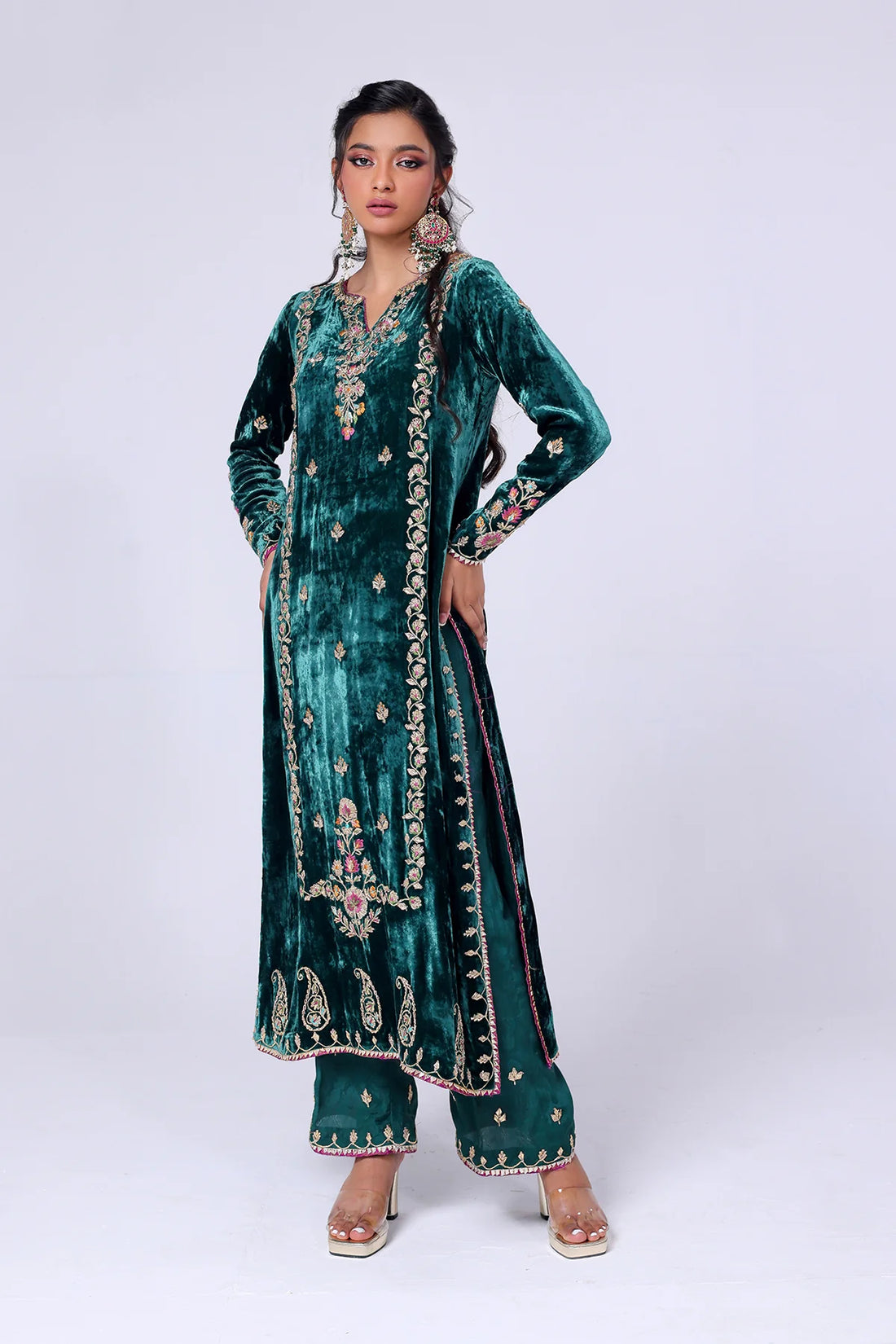 Green velvet embroidered shirt with magenta accents, paired with raw silk pants and a matching organza dupatta – formal 3-piece suit by Pakistanimoda.com.