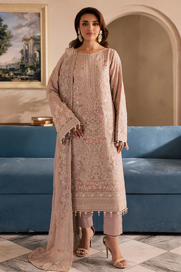 Peach pink embroidered chiffon suit with organza borders and raw silk trousers – perfect for Pakistani wedding guests in USA, UK, and Canada.

