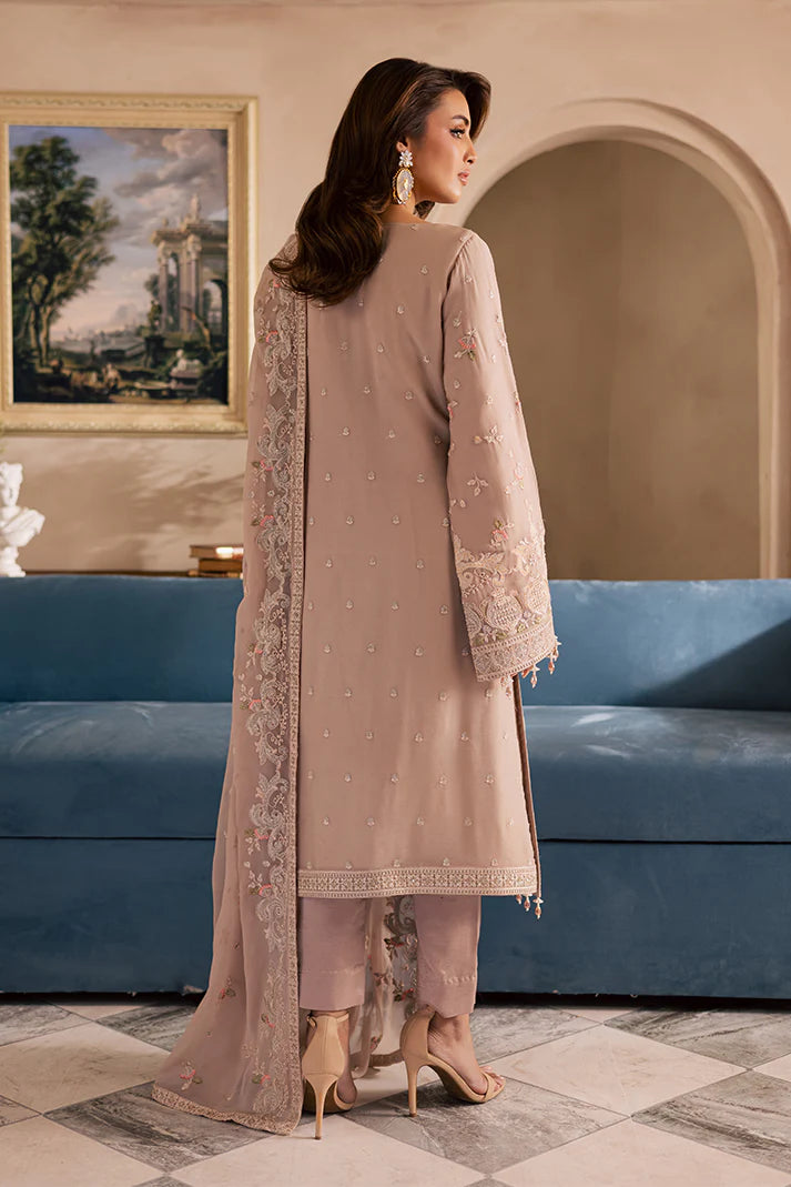 Peach pink embroidered chiffon suit with organza borders and raw silk trousers – perfect for Pakistani wedding guests in USA, UK, and Canada.

