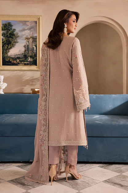 Peach pink embroidered chiffon suit with organza borders and raw silk trousers – perfect for Pakistani wedding guests in USA, UK, and Canada.

