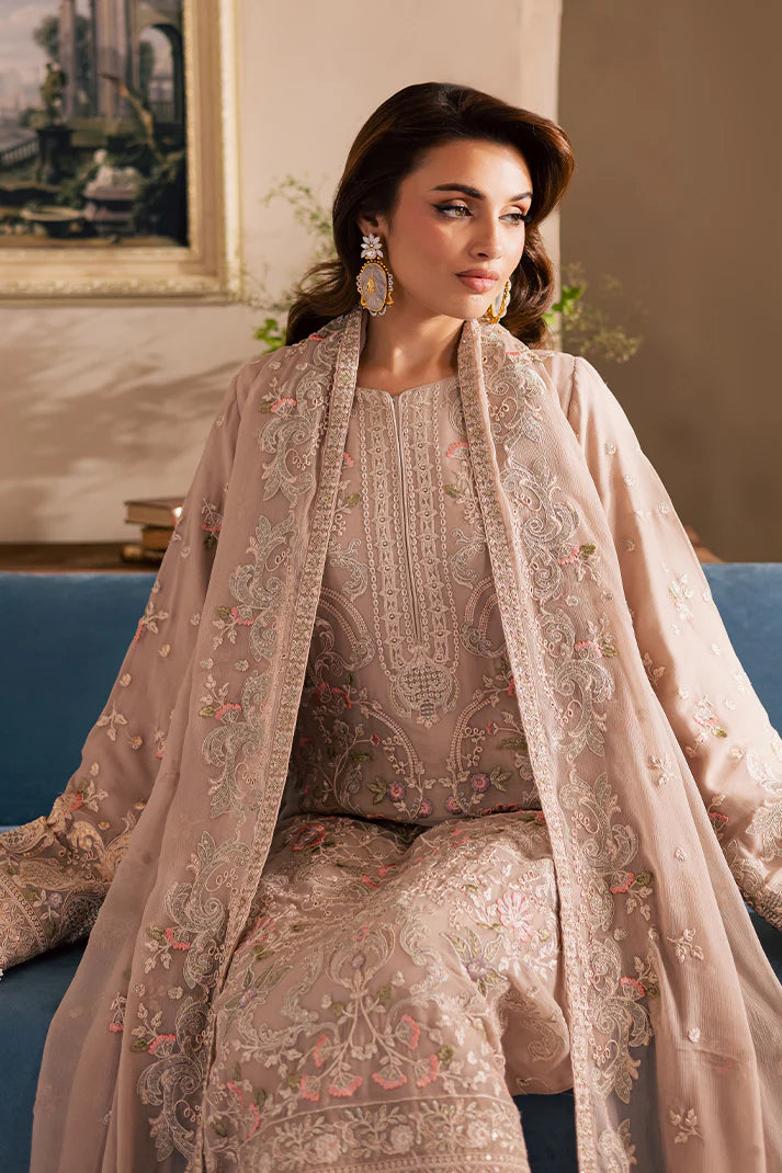 Peach pink embroidered chiffon suit with organza borders and raw silk trousers – perfect for Pakistani wedding guests in USA, UK, and Canada.

