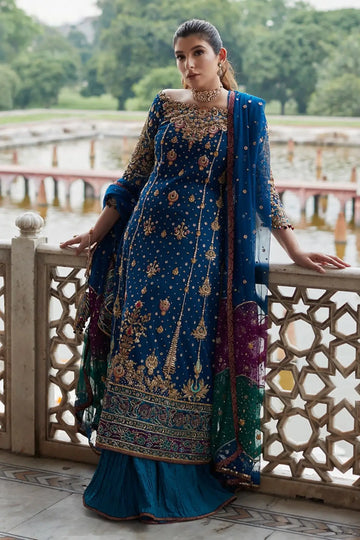 Navy peacock blue stitched formal dress with hand embellishment, net kalidaar shirt and crushed lehenga at Pakistanimoda