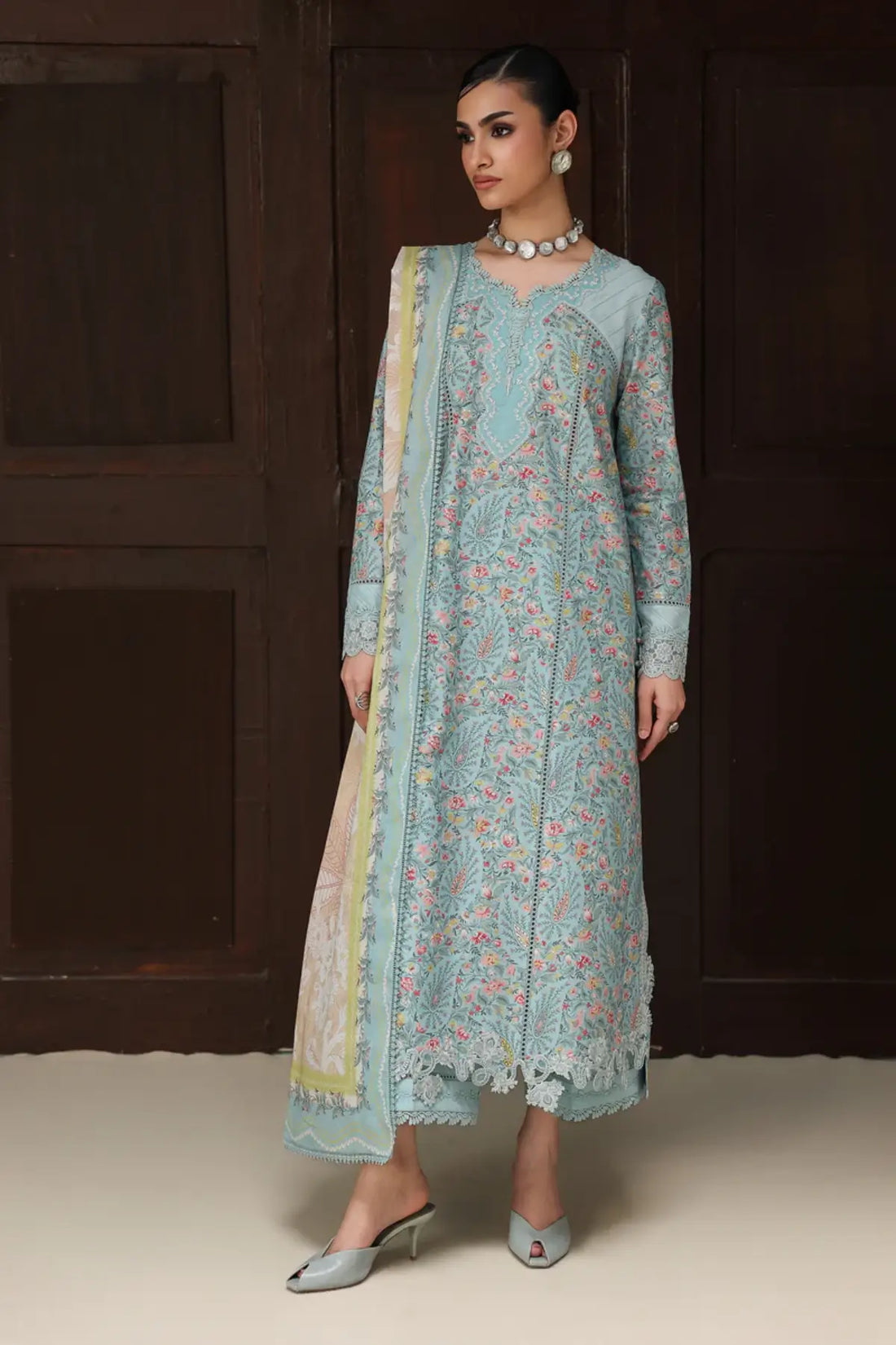 Nazia QQP-04(A) by Qalamkar ice blue lawn stitched 3PC suit with embroidered neckline, printed lawn dupatta, and plain cotton trousers.