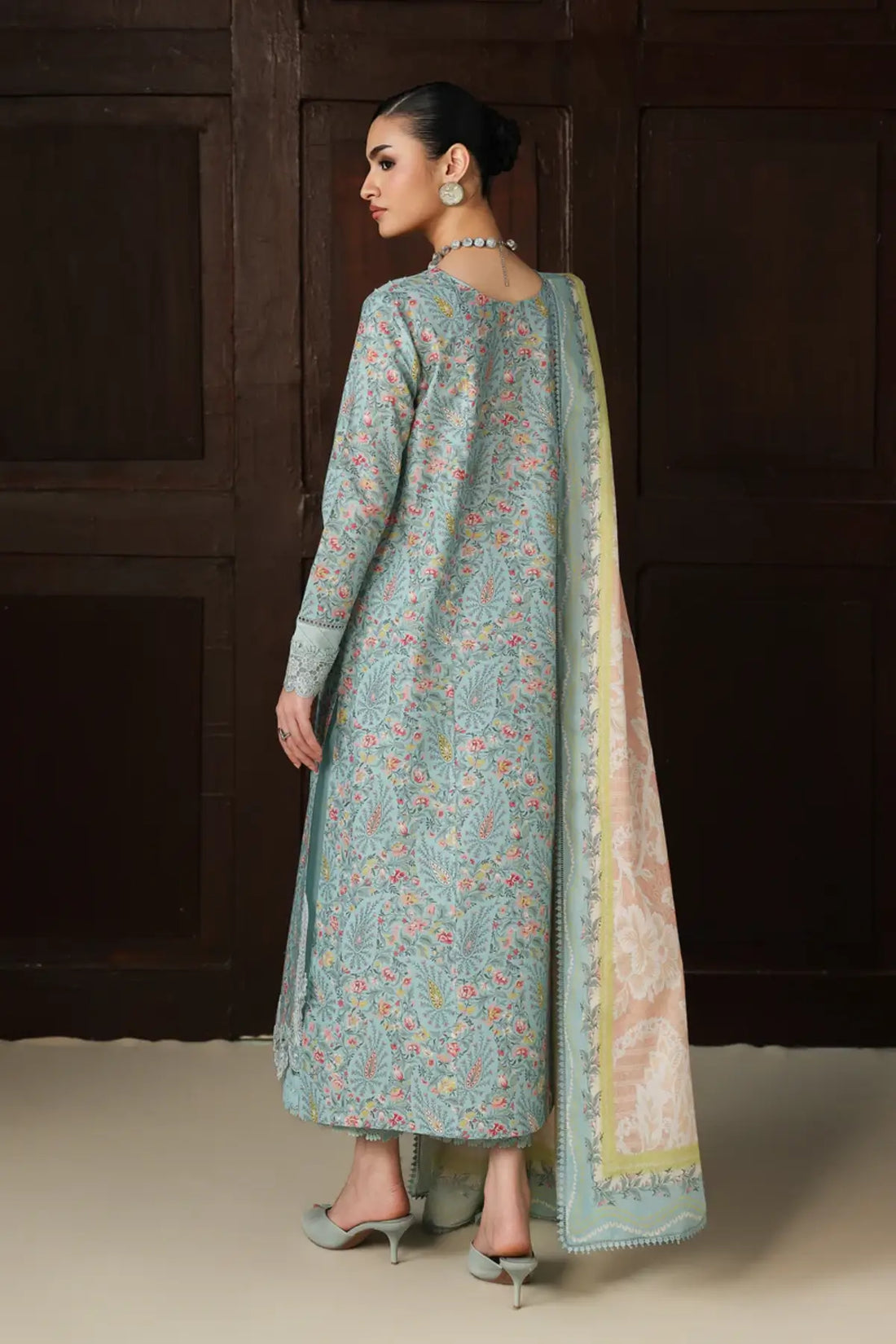 Nazia QQP-04(A) by Qalamkar ice blue lawn stitched 3PC suit with embroidered neckline, printed lawn dupatta, and plain cotton trousers.