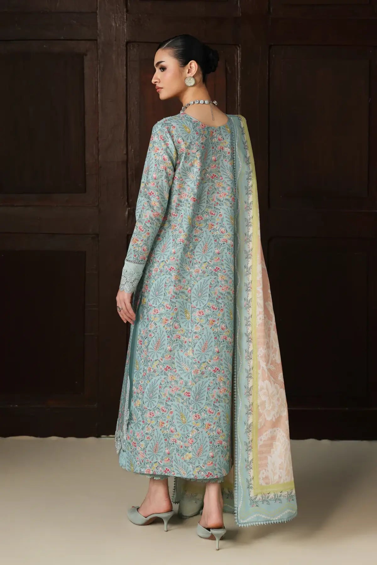 Nazia QQP-04(A) by Qalamkar ice blue lawn stitched 3PC suit with embroidered neckline, printed lawn dupatta, and plain cotton trousers.