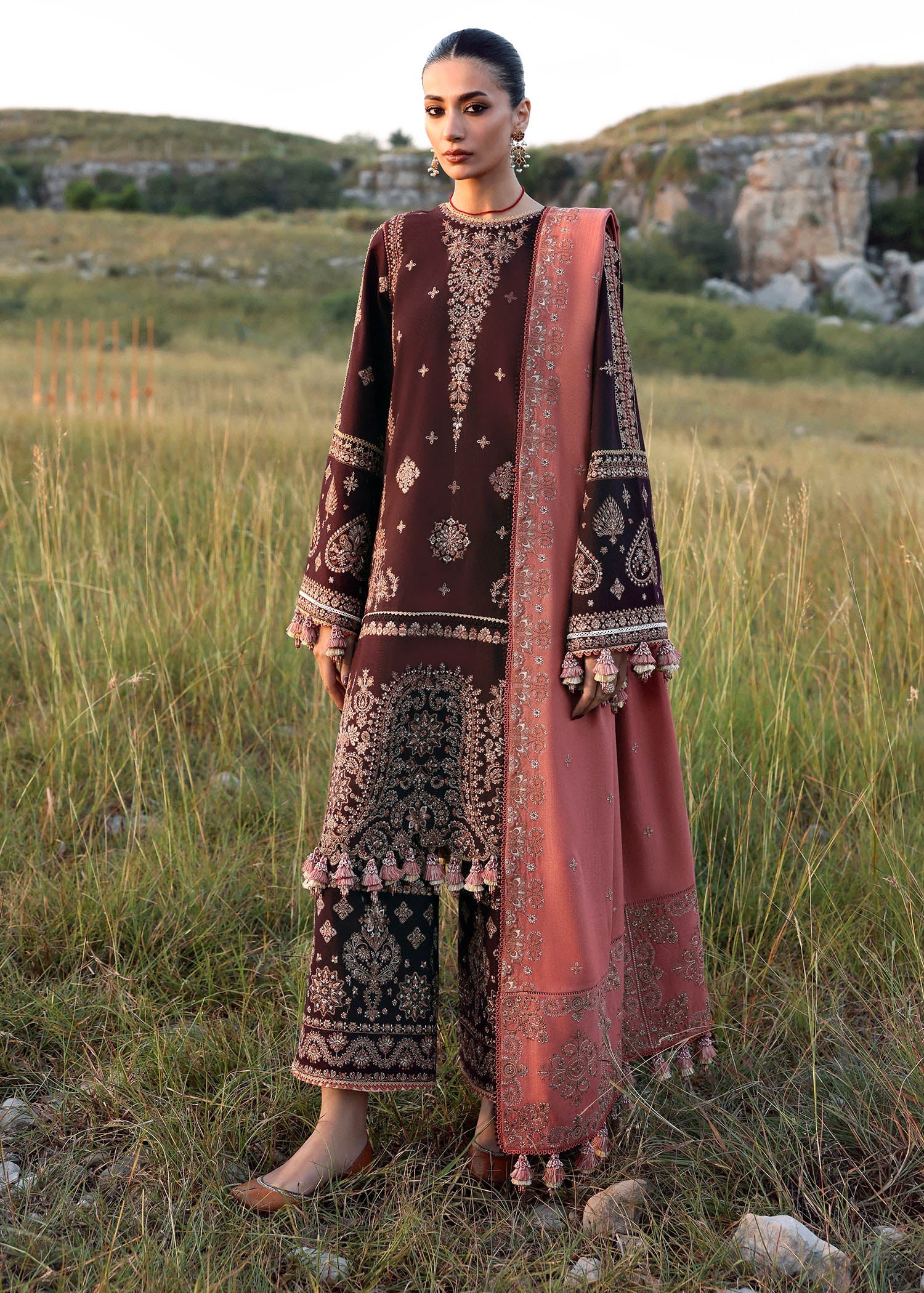 Nazneen Hussain Rehar plum embroidered khaddar stitched suit with peach wool shawl at Pakistanimoda.