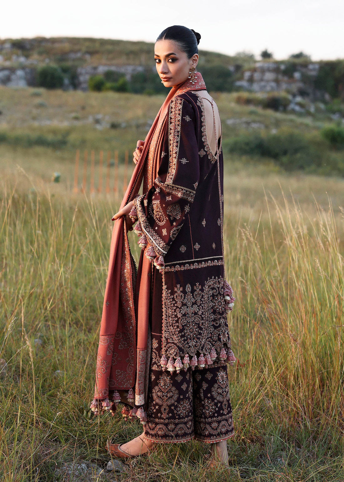 Nazneen Hussain Rehar plum embroidered khaddar stitched suit with peach wool shawl at Pakistanimoda.