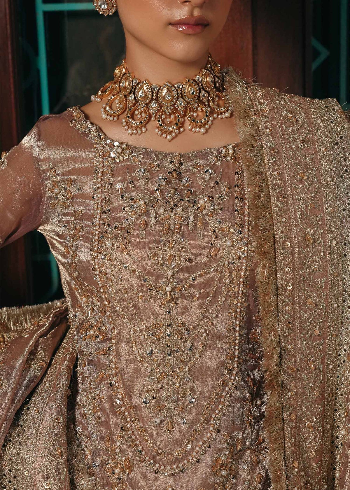 Nazo baby pink tissue gharara dress with embroidered shirt, badla fabric gharara, and tissue dupatta by Kanwal Malik from the Saheli Luxury Pret Collection.