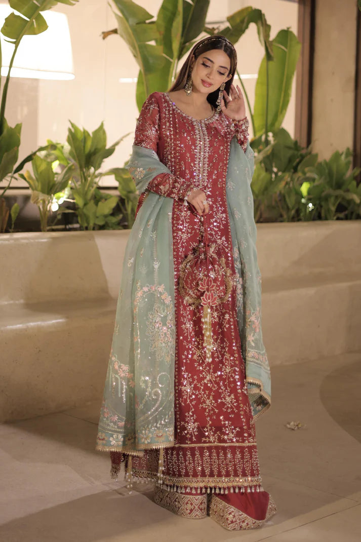 Neriha- Rust organza kurta with intricate resham and tilla embroidery By- Saad Bin Shahzad