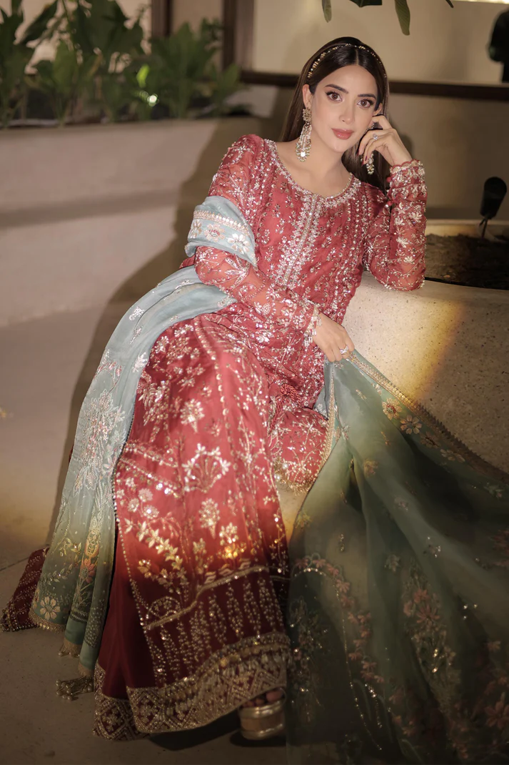 Neriha- Rust organza kurta with intricate resham and tilla embroidery By- Saad Bin Shahzad