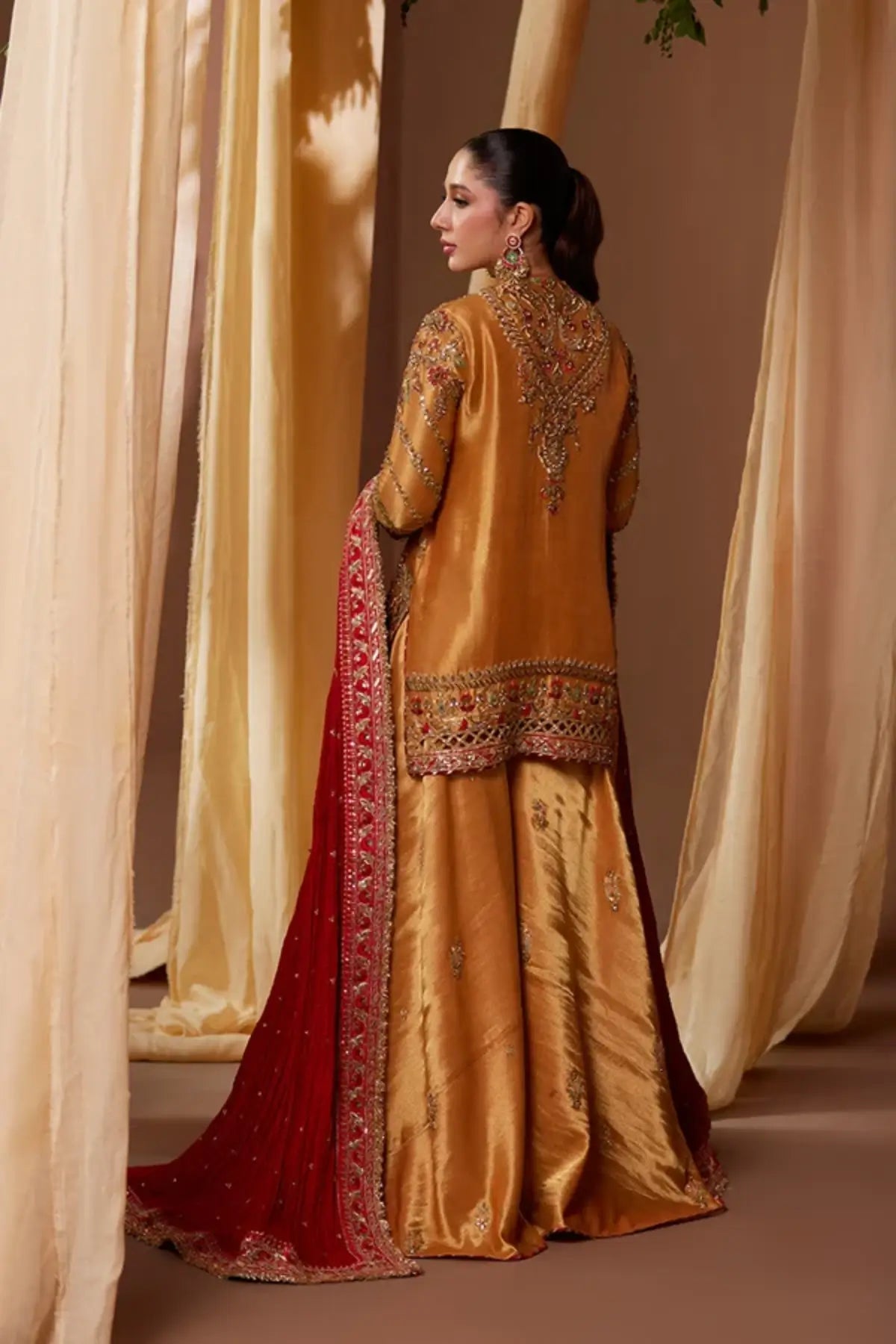 Nikita Burnt Orange Zardozi Lame Mehndi Night Stitched Suit with Mughal Embroidery, Lame Lehenga Pants and Red Silk Net Dupatta
