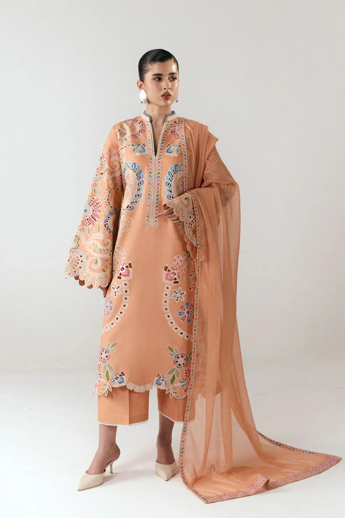 Peach Nila embroidered cotton suit by Jugnu Lahore with matching chiffon dupatta
