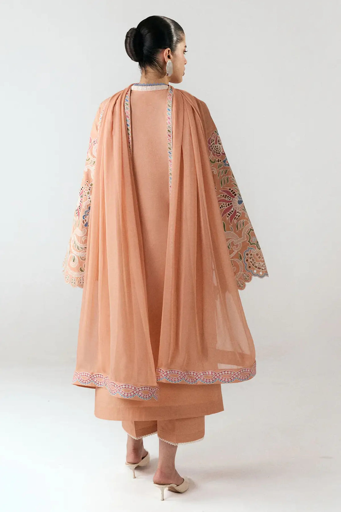 Peach Nila embroidered cotton suit by Jugnu Lahore with matching chiffon dupatta