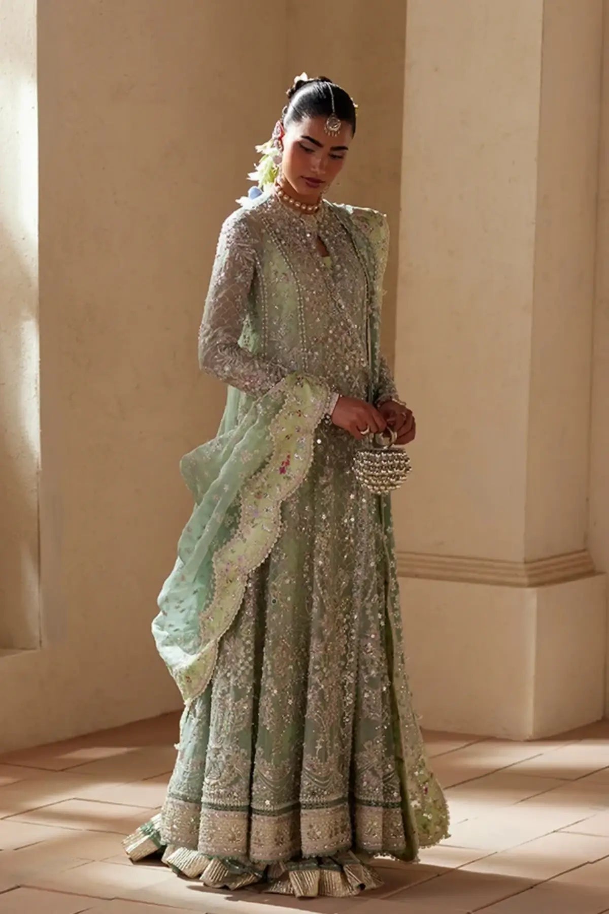 Nirvelle turquoise embellished organza Angrakha wedding suit with silk gharara and embroidered scalloped dupatta