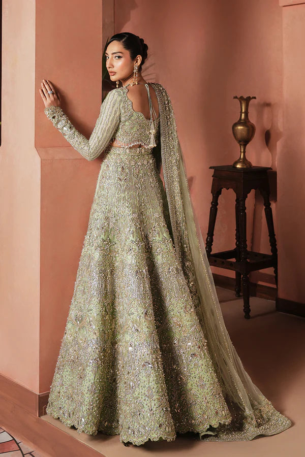 Crystal embellished Pakistani net bridal outfit in aqua green for Canadian brides, featuring handwork with sheesha, katdana, and soft net dupatta—ideal for modern Pakistani weddings in Canada.
