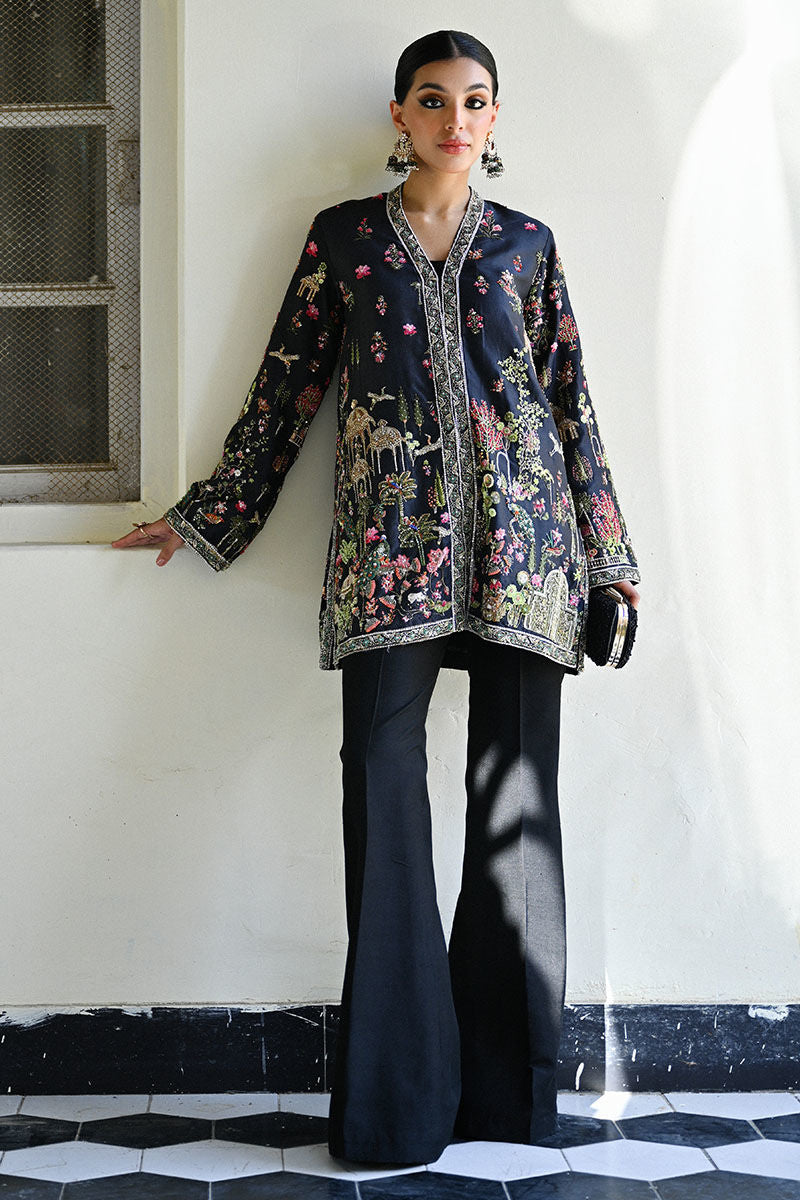 Elegant black Pakistani formal dress in raw silk with Kashmiri hand embroidery and Mughal motifs – wedding outfit for Canada, UK, USA.