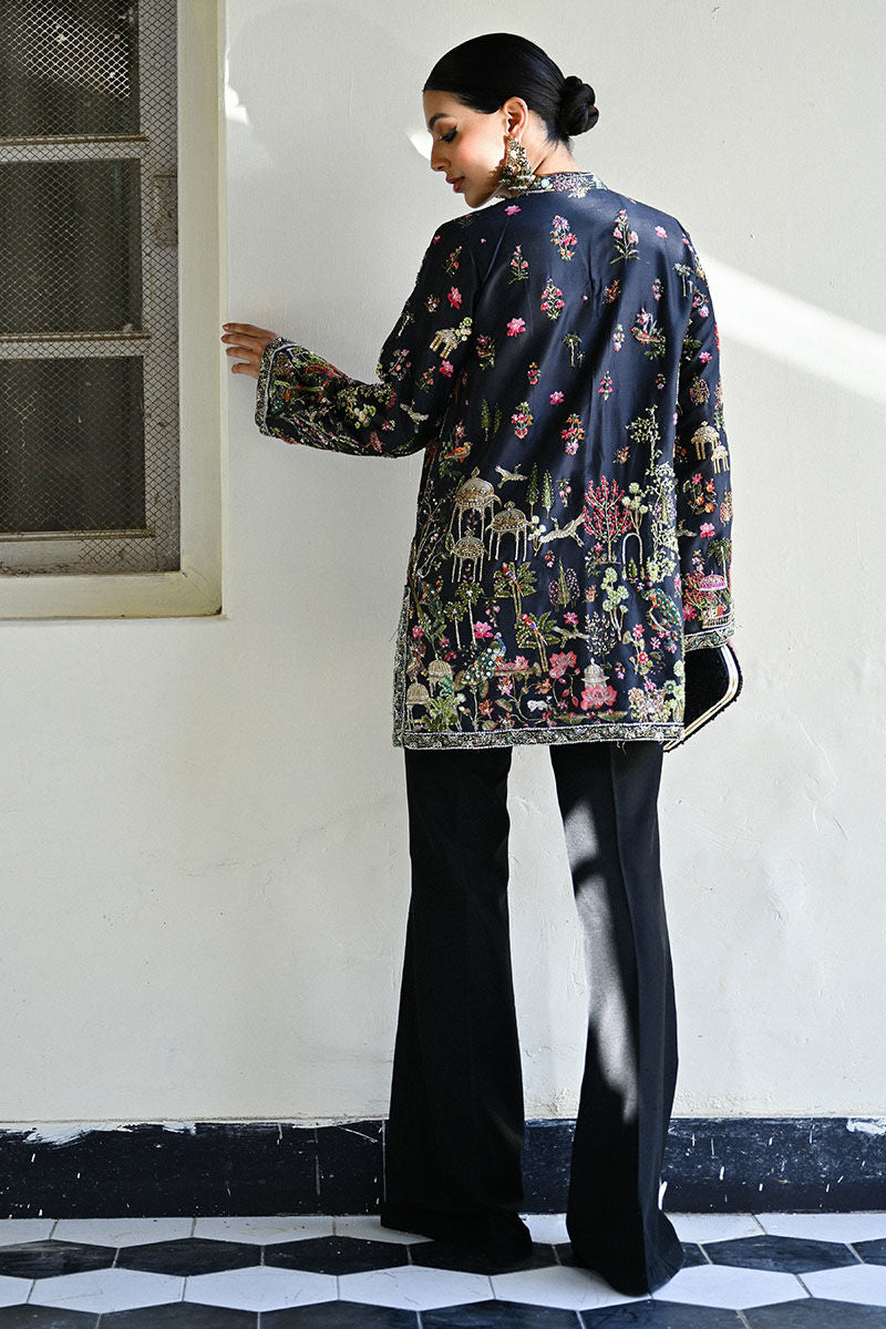 Elegant black Pakistani formal dress in raw silk with Kashmiri hand embroidery and Mughal motifs – wedding outfit for Canada, UK, USA.