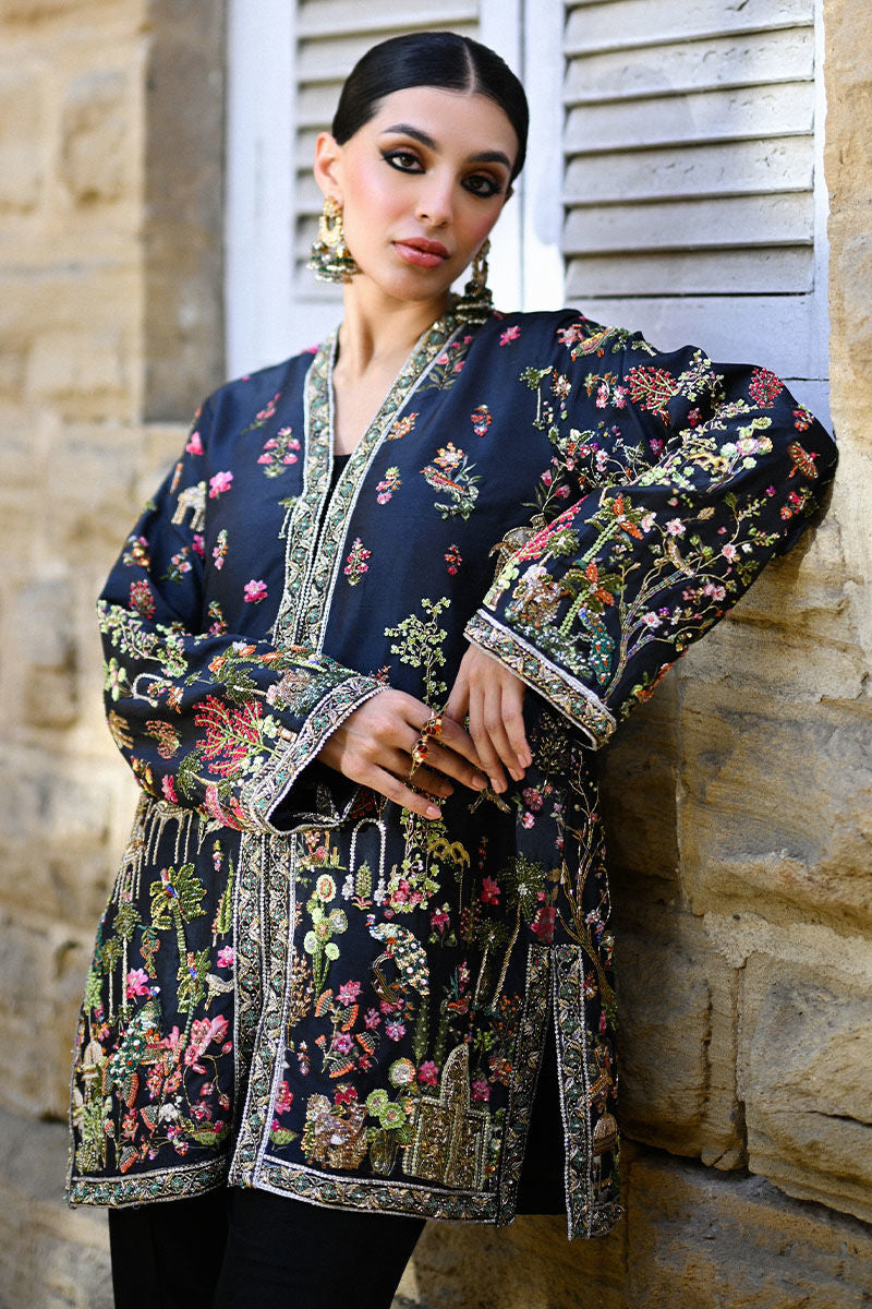 Elegant black Pakistani formal dress in raw silk with Kashmiri hand embroidery and Mughal motifs – wedding outfit for Canada, UK, USA.