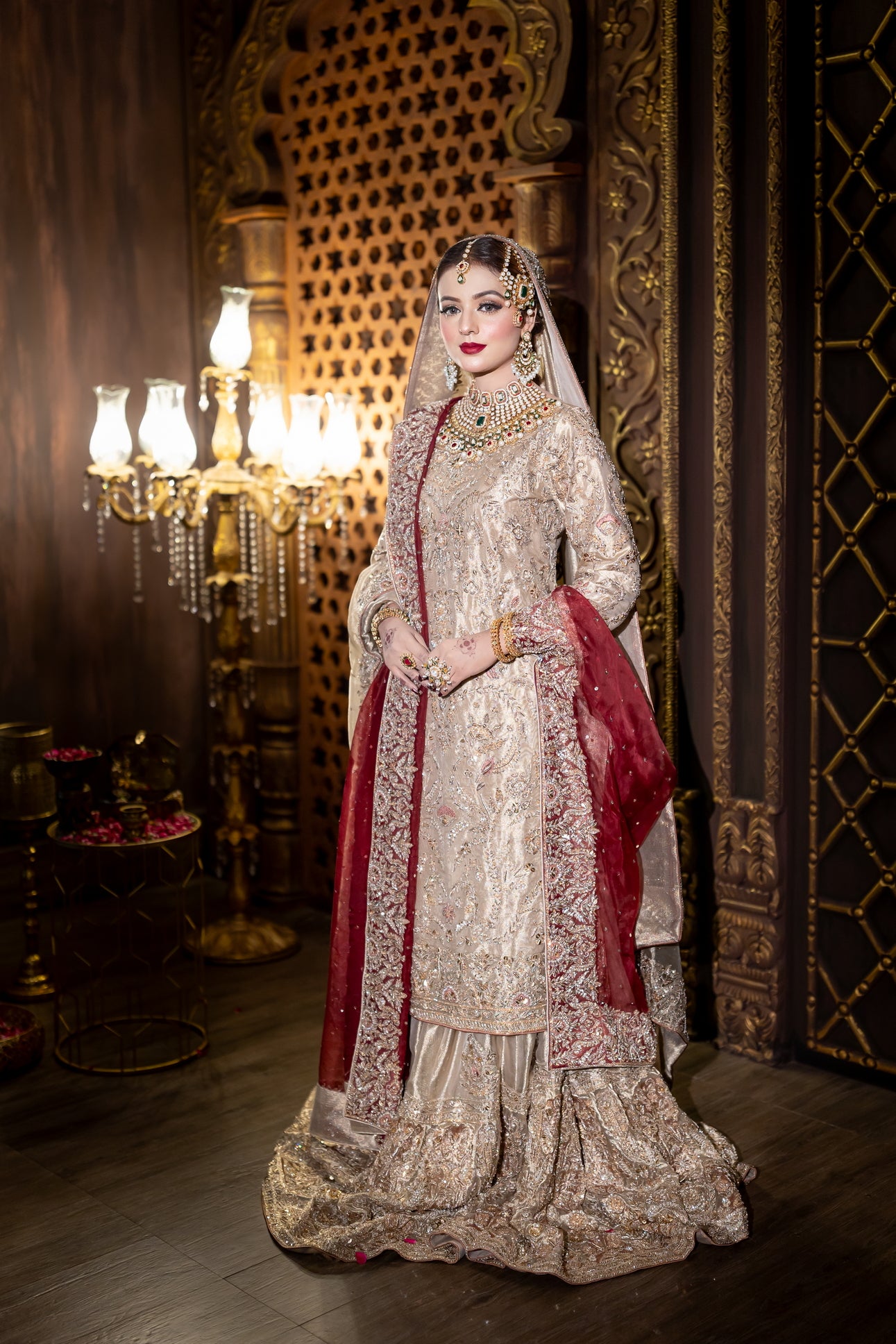 Noorjehan gold tissue bridal gharara set with red organza dupatta – Pakistani wedding outfit by MariamRaj.com.