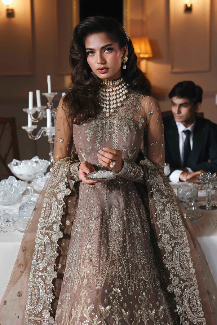 Noorzaib regal net embroidered bridal pishwas outfit with organza dupatta by Akbar Aslam, luxury couture for Pakistani brides at weddings and receptions.