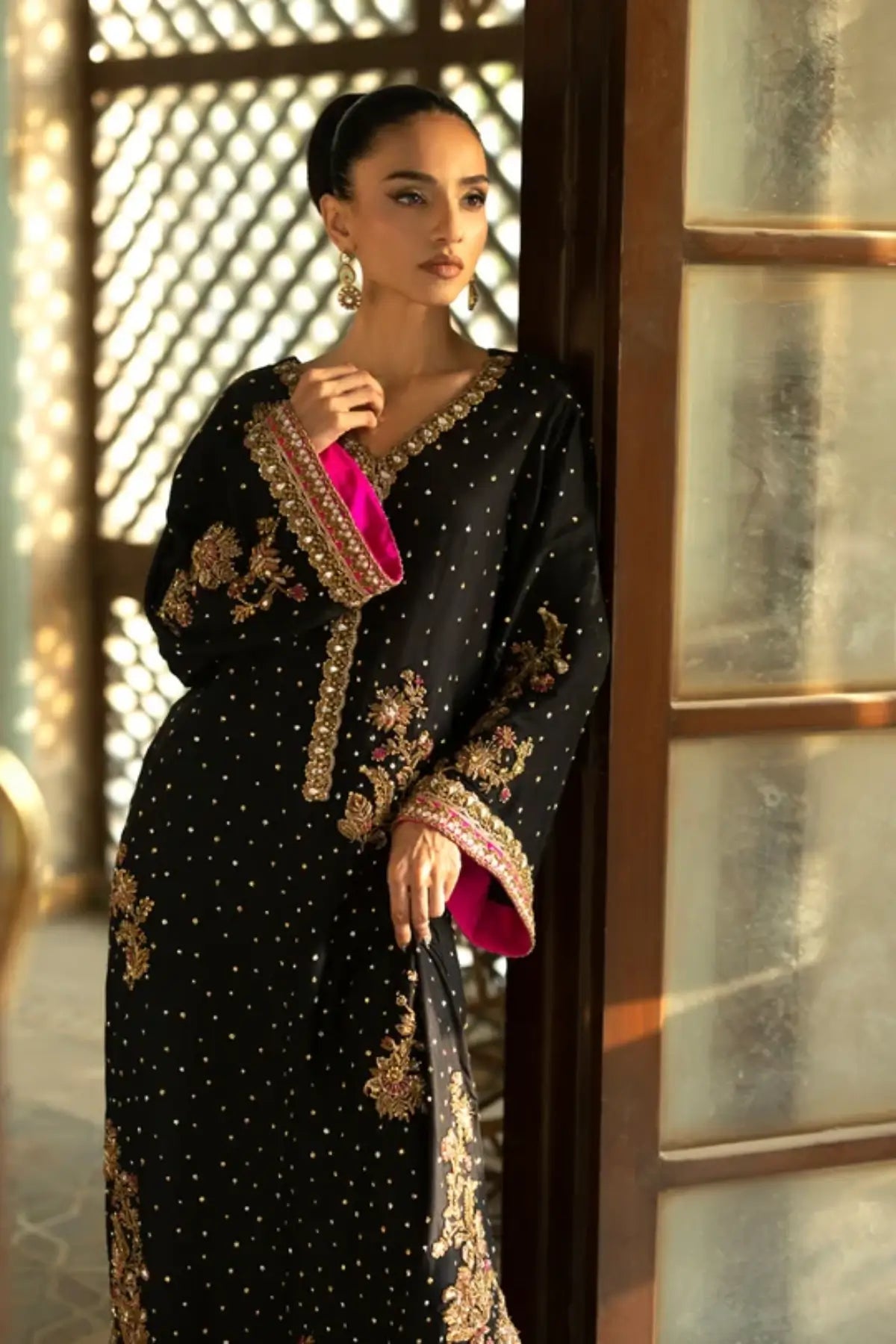 Nuit Elegance black raw silk embellished stitched party wear kaftan with floral Chan jaal and Zardozi embroidery