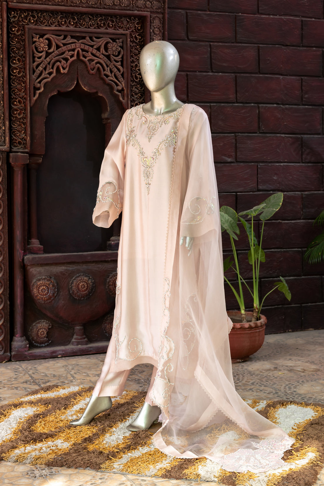 Soft blush pink designer Pakistani silk suit by MariamRaj with embroidered sheesha silk shirt and trousers, paired with a scalloped organza dupatta for women in USA and UK.