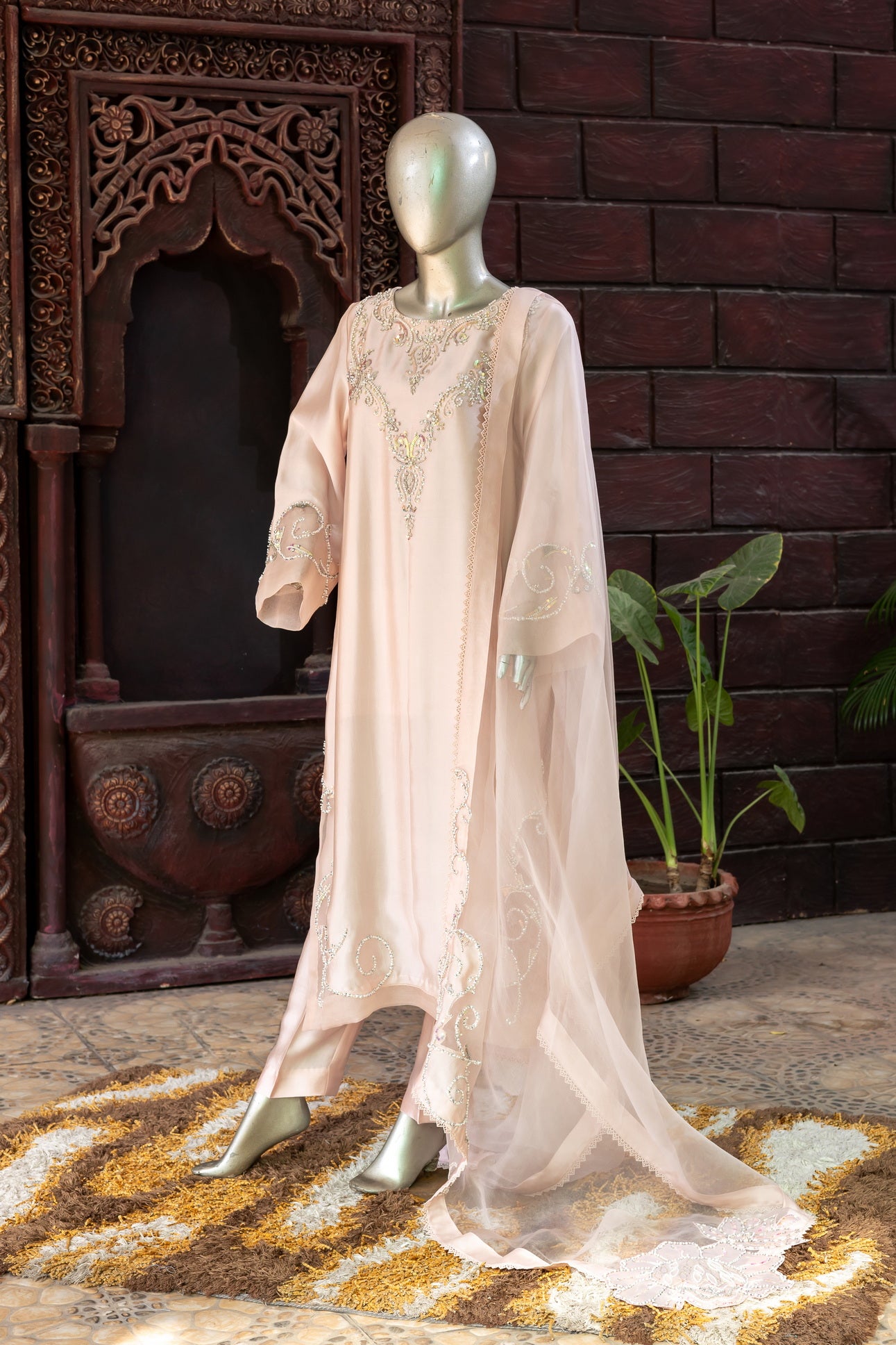 Soft blush pink designer Pakistani silk suit by MariamRaj with embroidered sheesha silk shirt and trousers, paired with a scalloped organza dupatta for women in USA and UK.