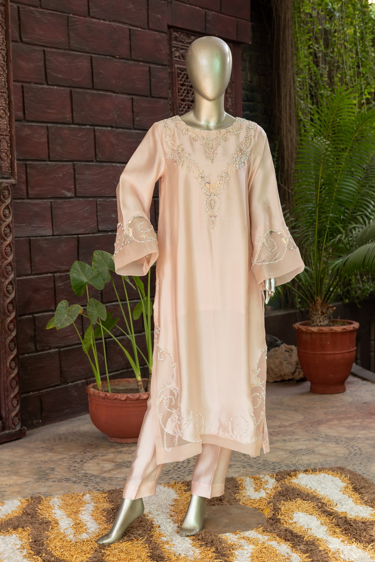 Soft blush pink designer Pakistani silk suit by MariamRaj with embroidered sheesha silk shirt and trousers, paired with a scalloped organza dupatta for women in USA and UK.