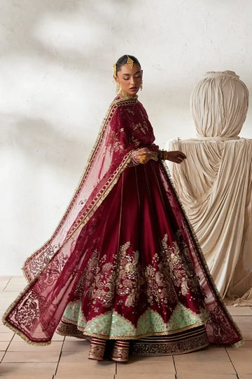 Nusha deep red embellished sheesha silk wedding pishwas with silver embroidery, raw silk lehenga and gold floral organza dupatta
