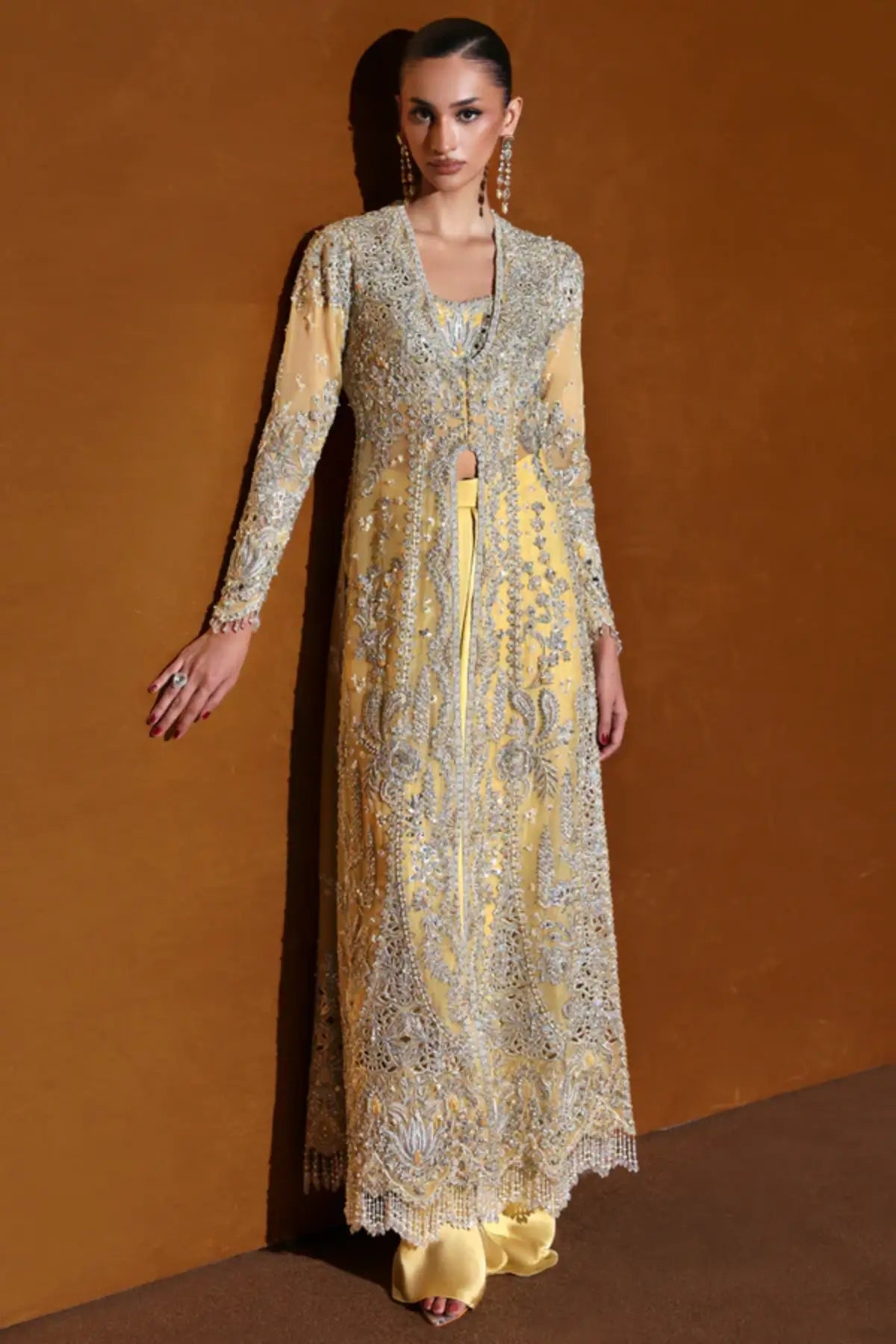 Nuvrae by Soraya Oriana Luxury Formals '26 yellow hand embellished net wedding dress with net dupatta and raw silk trousers