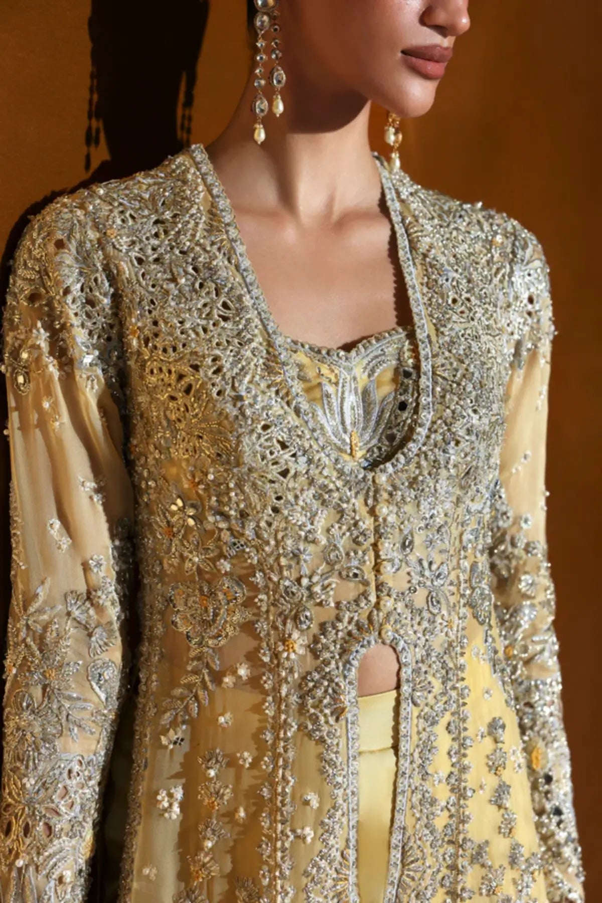 Nuvrae by Soraya Oriana Luxury Formals '26 yellow hand embellished net wedding dress with net dupatta and raw silk trousers