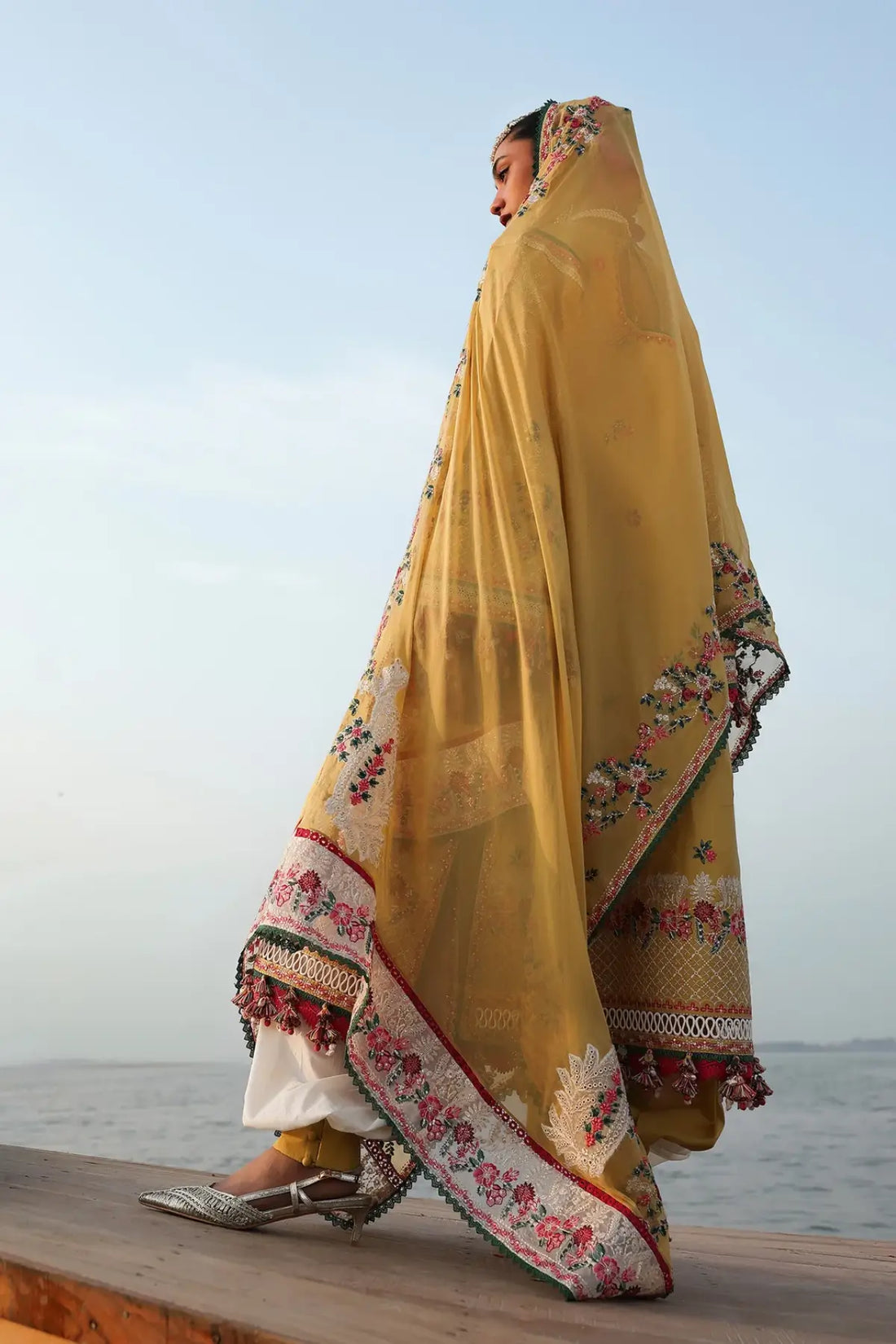 Hussain Rehar Ochre mustard yellow lawn suit with multicolor floral embroidery and chiffon dupatta