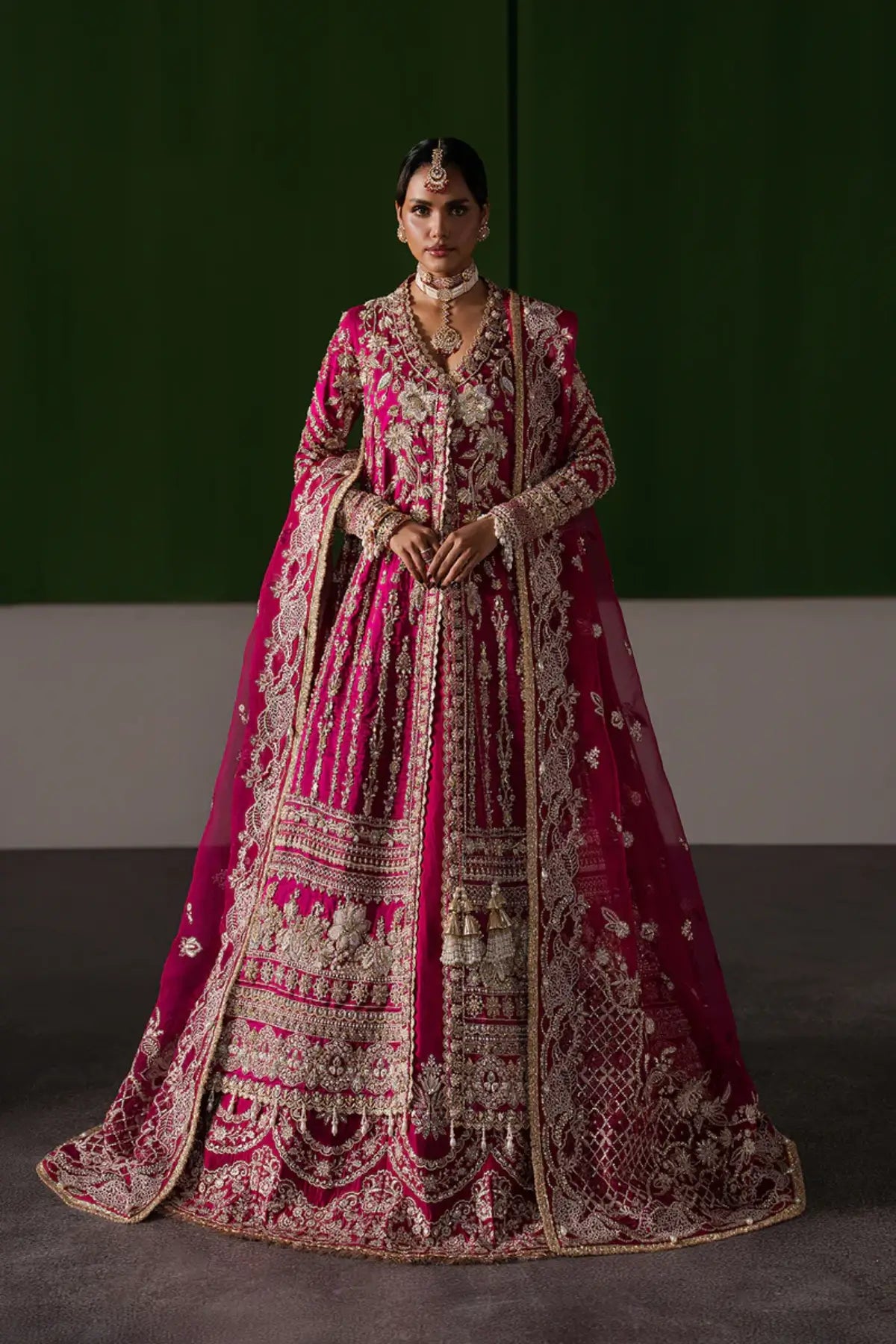 Ophelia by Afrozeh fuchsia pink stitched rawsilk bridal lehenga with heavy embroidery