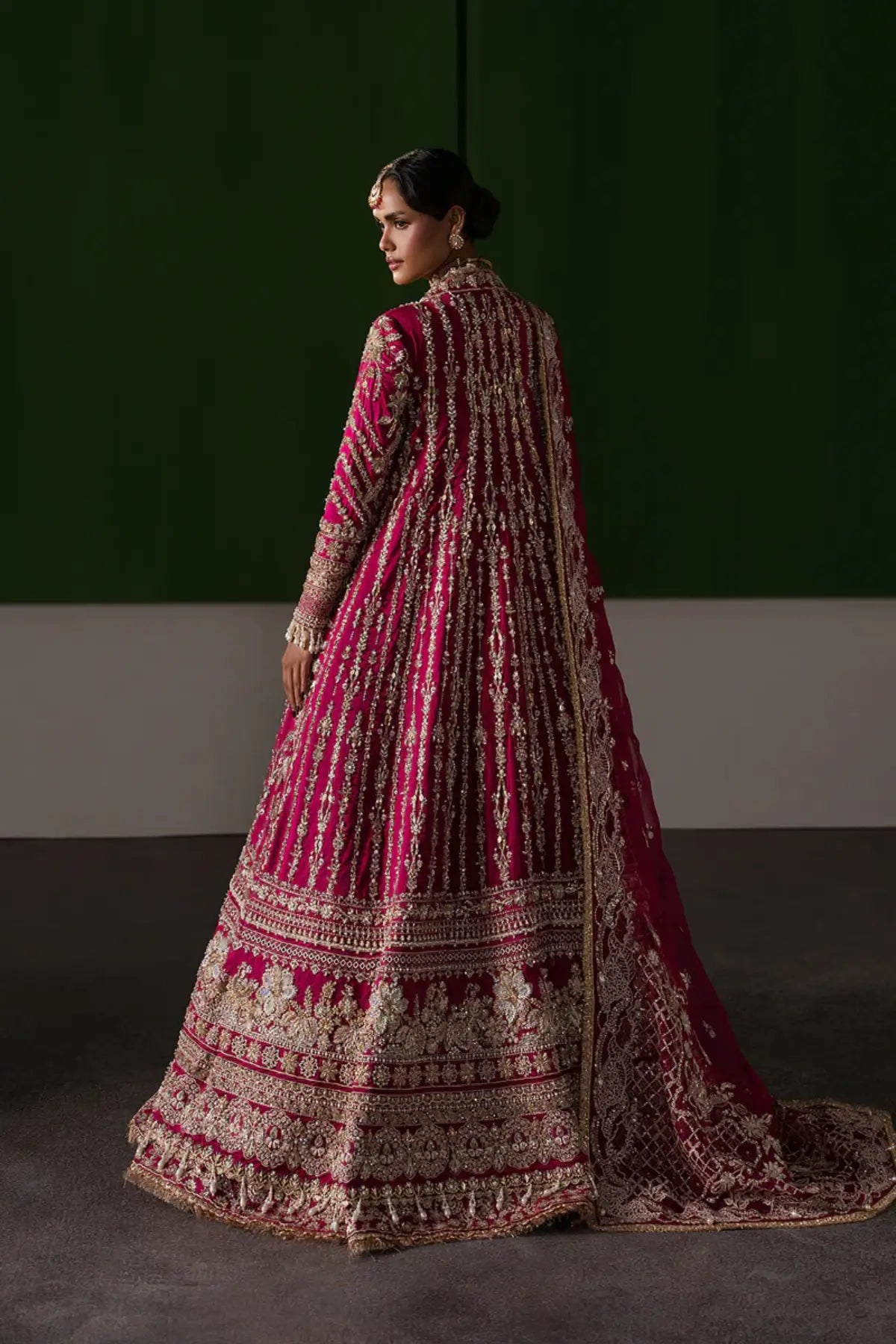 Ophelia by Afrozeh fuchsia pink stitched rawsilk bridal lehenga with heavy embroidery