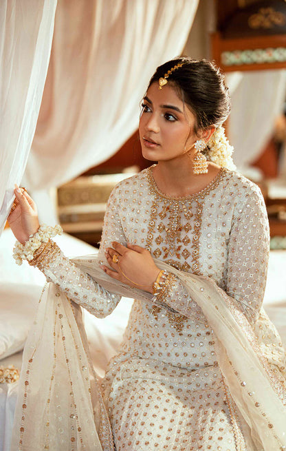 PAREESA ivory Pakistani outfit with chiffon shirt, dabka and mirror work, embellished silk culottes, and organza dupatta – formal wear by Pakistanimoda.com