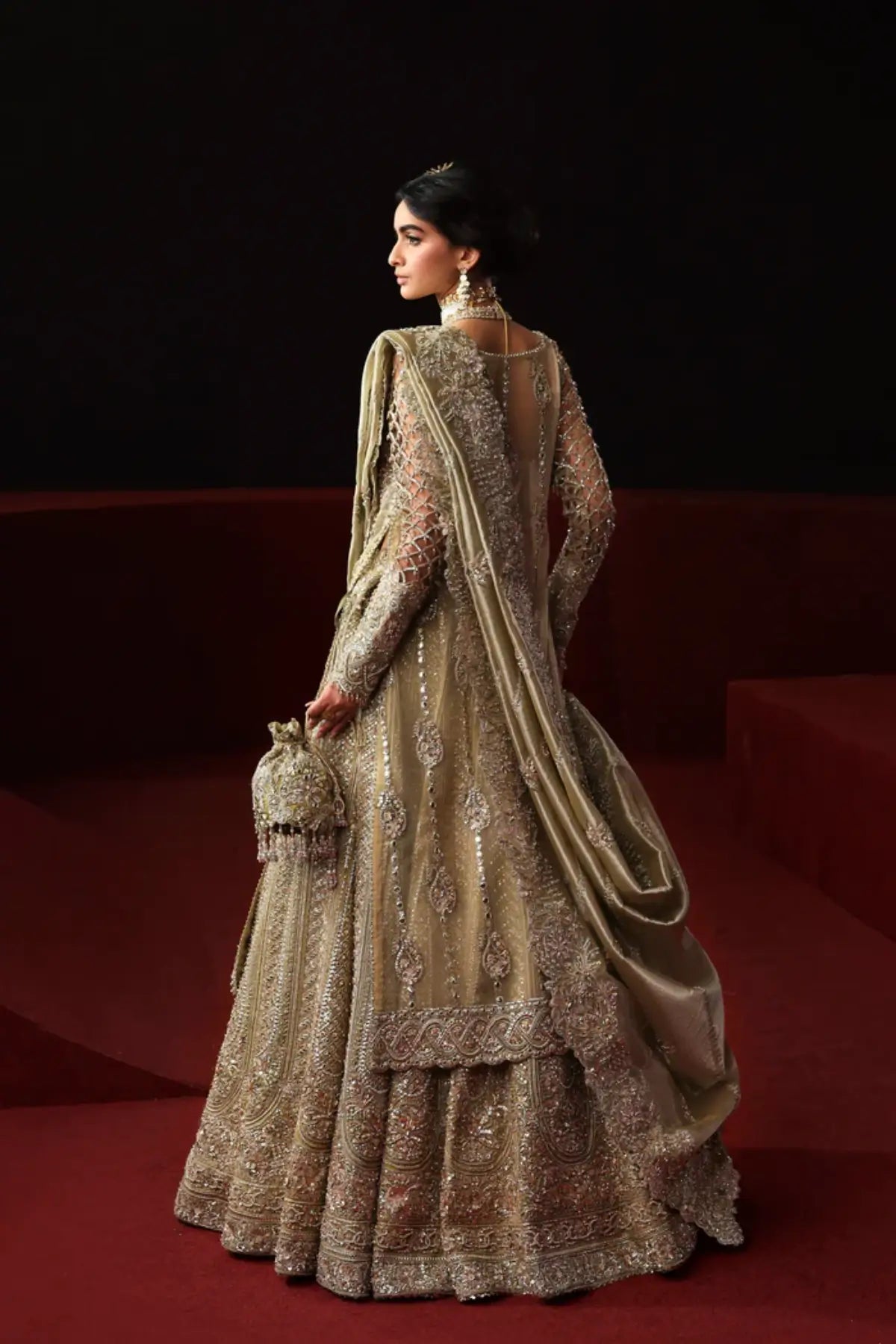 Pariza olive green embellished bridal outfit from Akbar Aslam Serena Bridal Edit '26 with front-open shirt and lehenga.