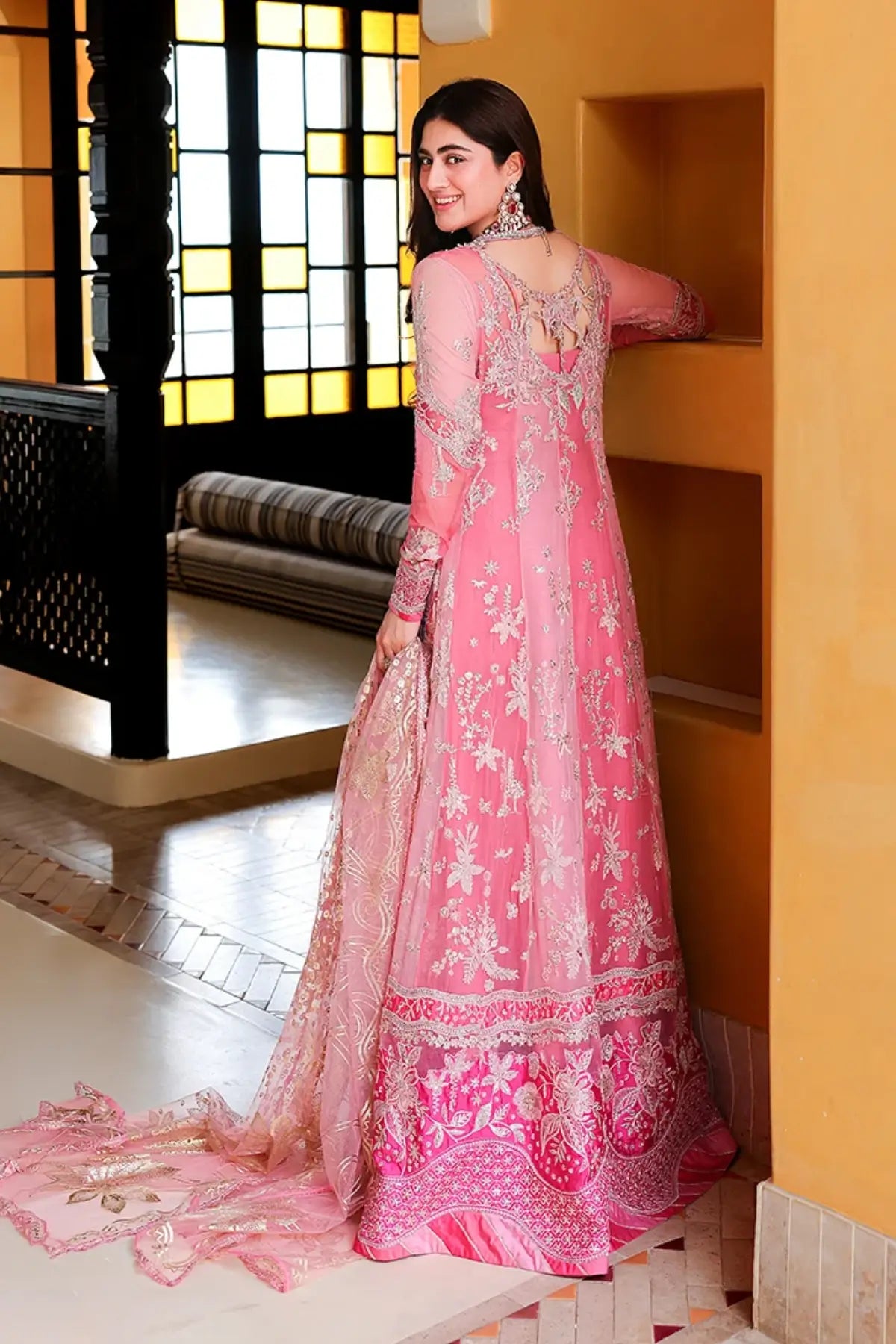 Pink Promise pink embellished sequinned chiffon Eid formal stitched dress with handworked neckline, raw silk trouser and foil printed net dupatta