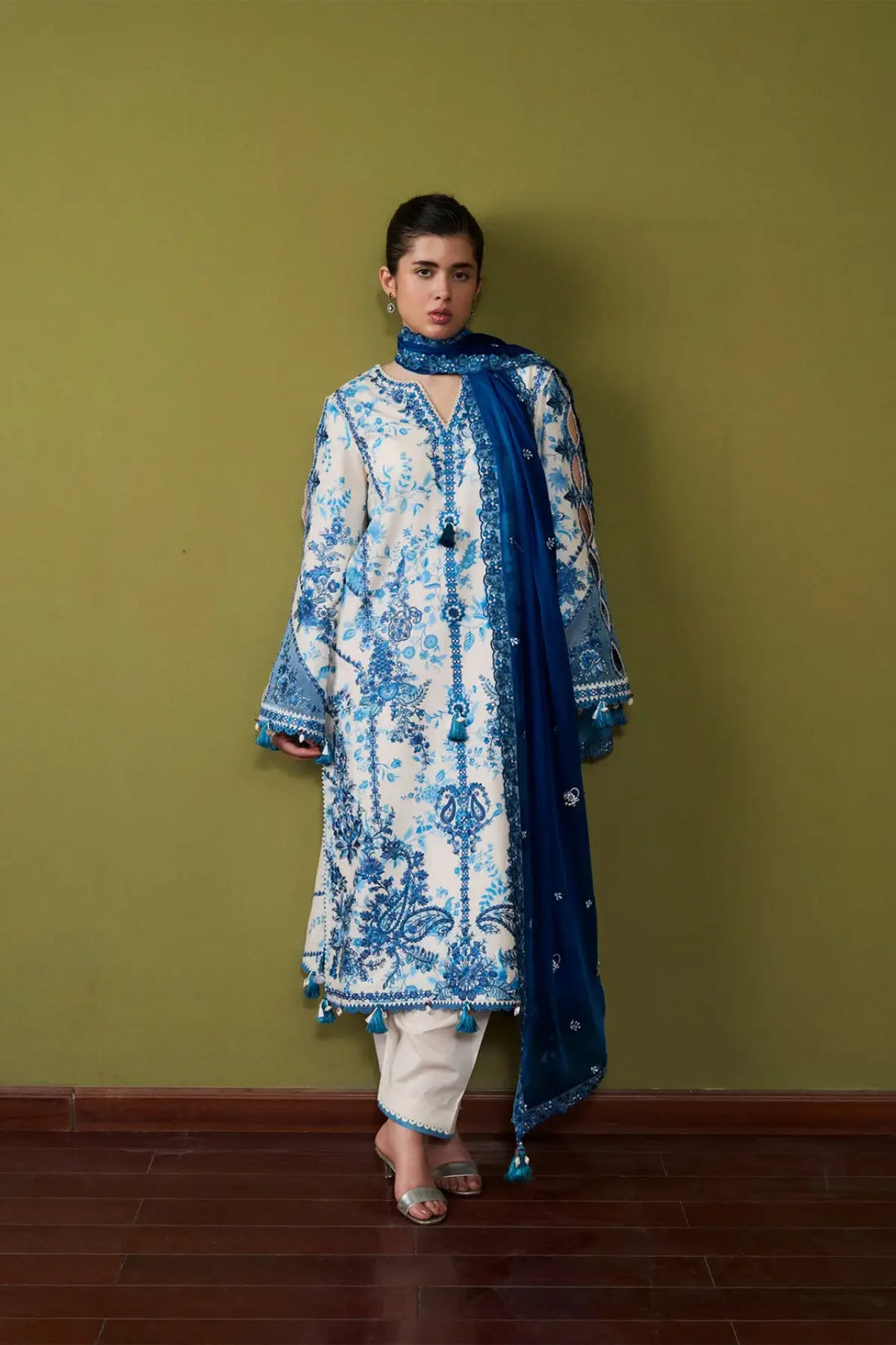 Porcelain Hussain Rehar Pret SS'26 off white lawn 3PC suit with cobalt blue embroidery and chiffon dupatta.