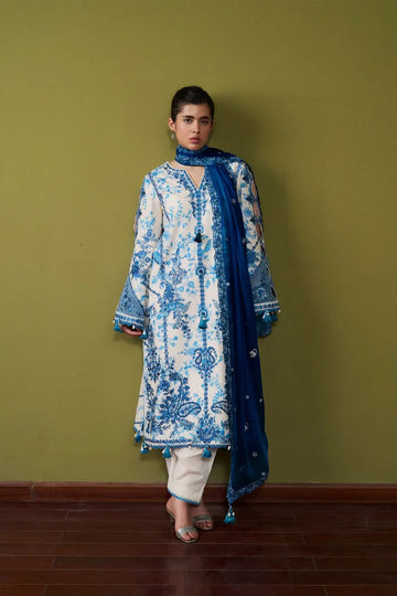 Porcelain Hussain Rehar Pret SS'26 off white lawn 3PC suit with cobalt blue embroidery and chiffon dupatta.