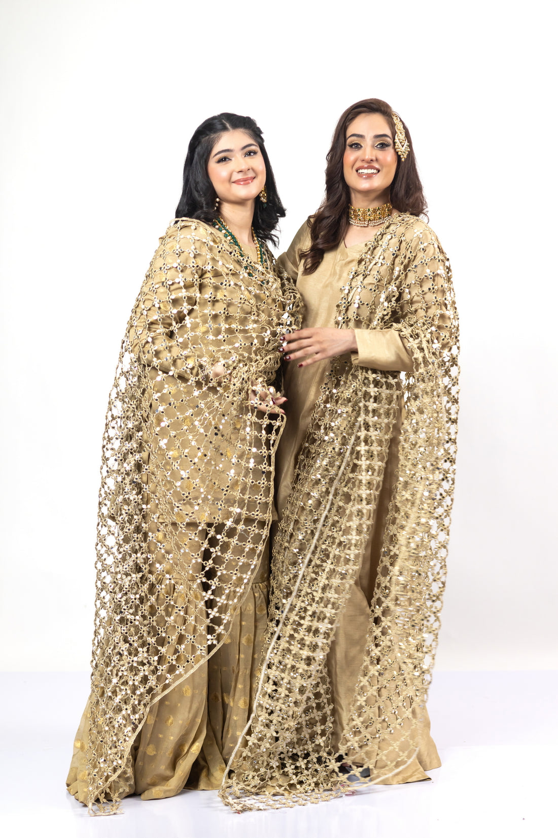 Gold Designer Frock & Gharara Set by MariamRaj with zardoze and resham embroidery for weddings and mehndi.