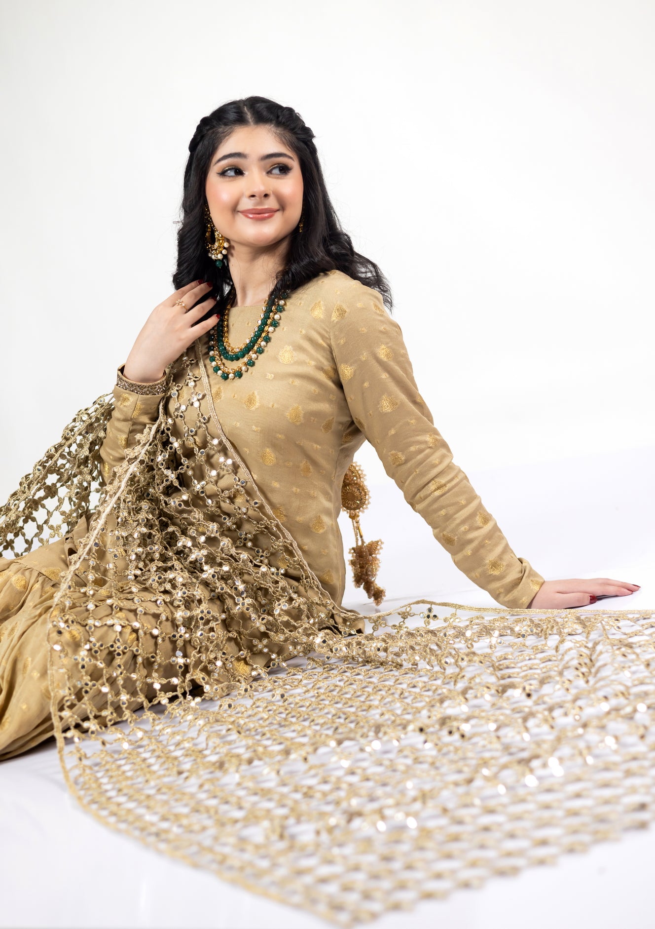 Gold Designer Frock & Gharara Set by MariamRaj with zardoze and resham embroidery for weddings and mehndi.