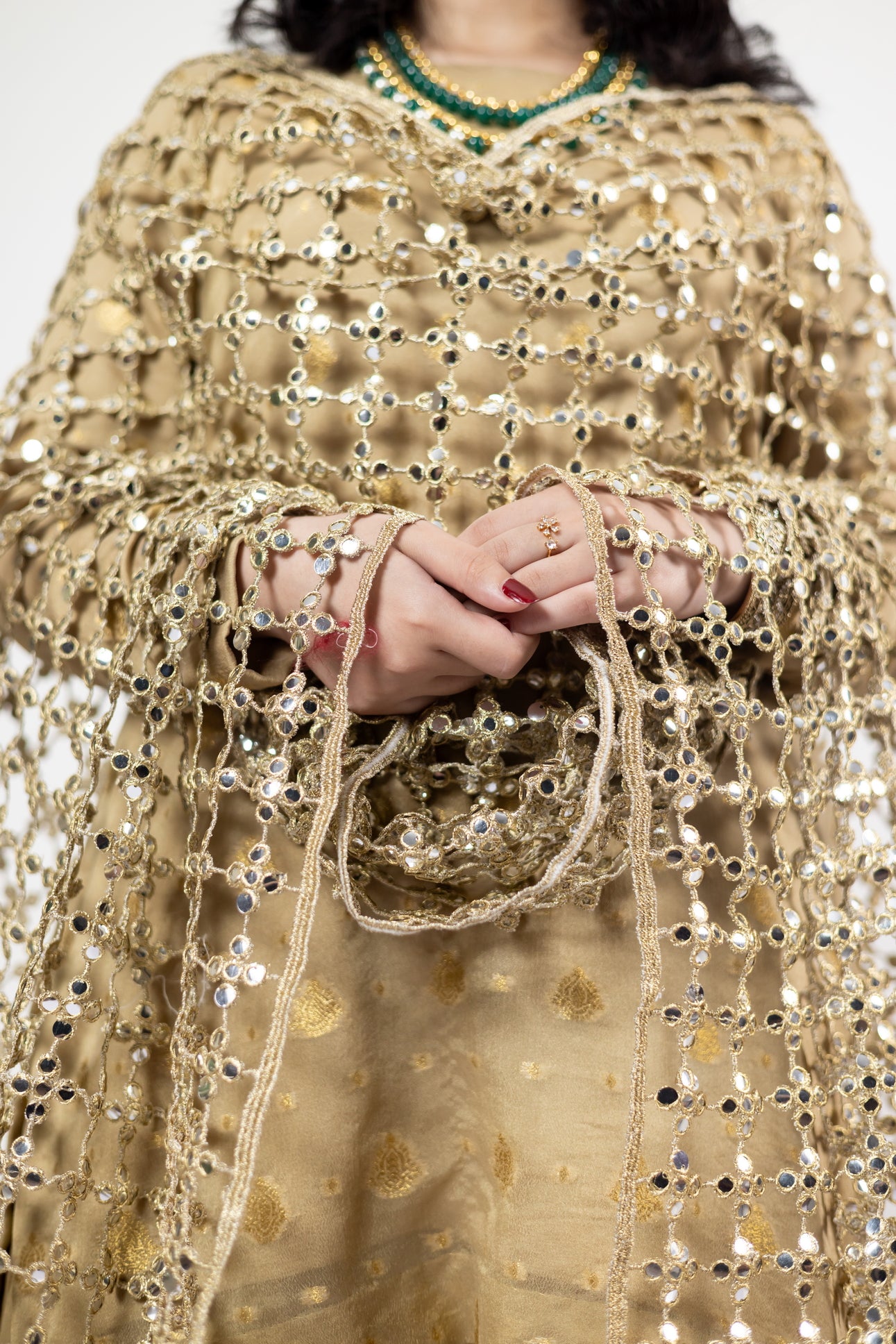 Gold Designer Frock & Gharara Set by MariamRaj with zardoze and resham embroidery for weddings and mehndi.